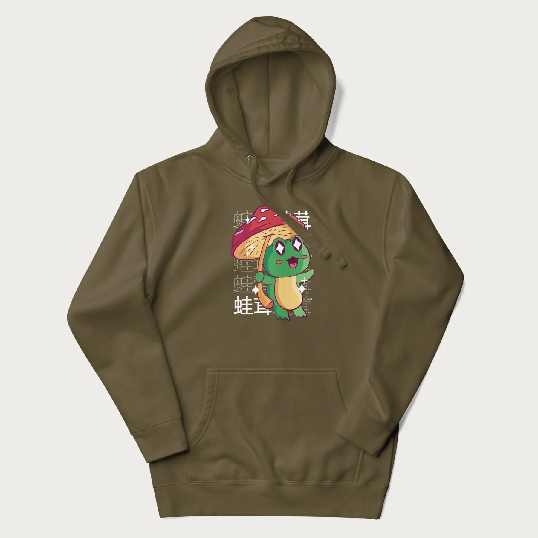 Military green hoodie with Japanese graphic of a cute green frog holding a red mushroom and Japanese text '蛙茸' in the background.