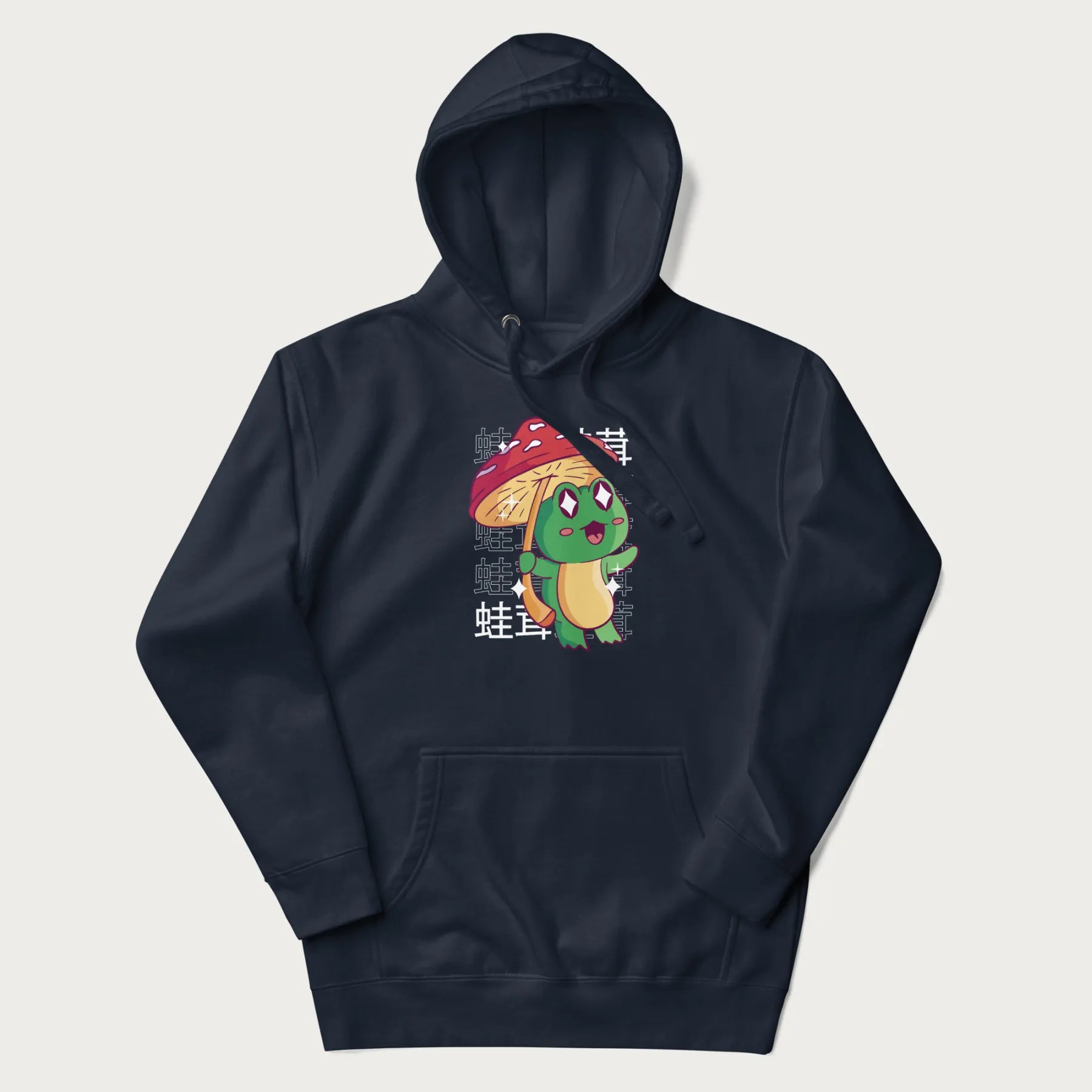 Navy blue hoodie with Japanese graphic of a cute green frog holding a red mushroom and Japanese text '蛙茸' in the background.