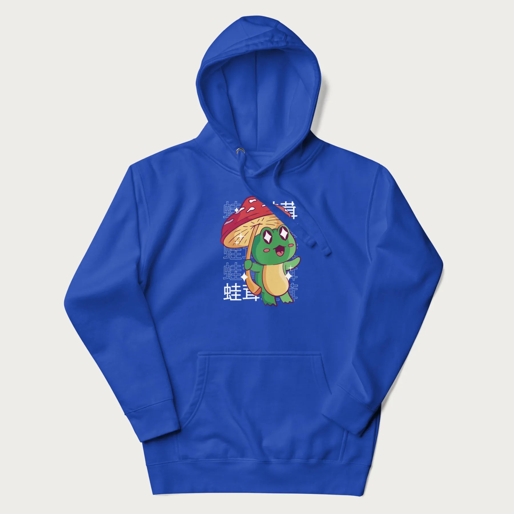 Royal blue hoodie with Japanese graphic of a cute green frog holding a red mushroom and Japanese text '蛙茸' in the background.