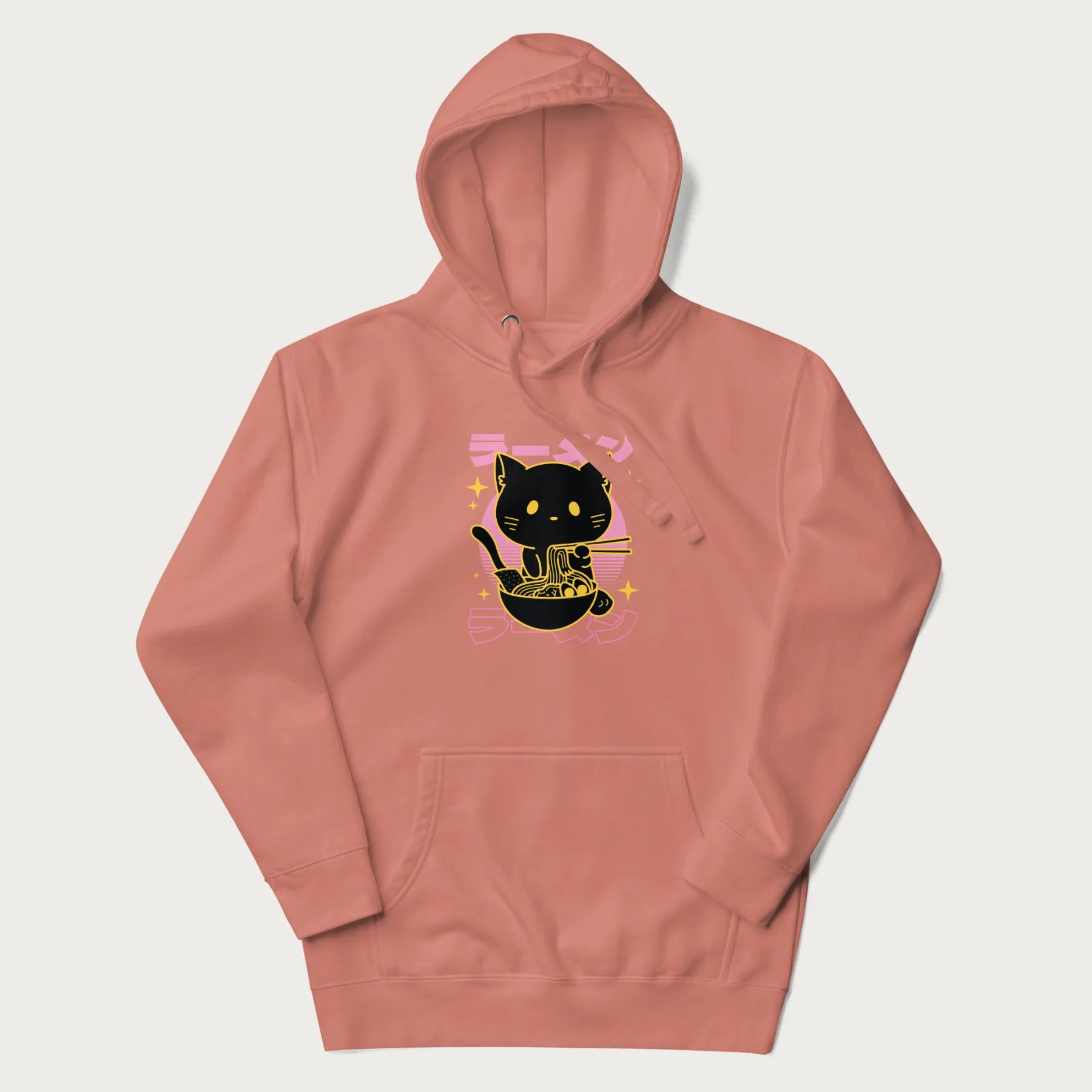 Light pink hoodie with Japanese text 'ラーメン' (ramen) and a retro design of a cute black cat eating ramen.