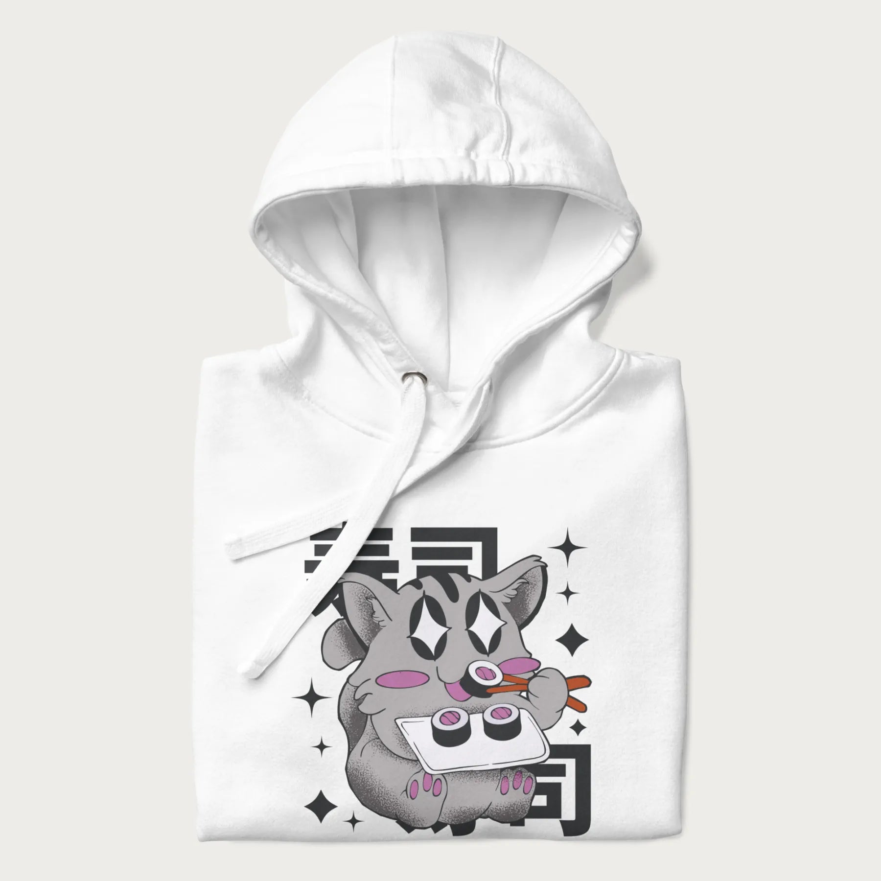 Folded white hoodie with Japanese graphic of a cute grey cat eating sushi, with the Japanese text '寿司' (Sushi) in the background.