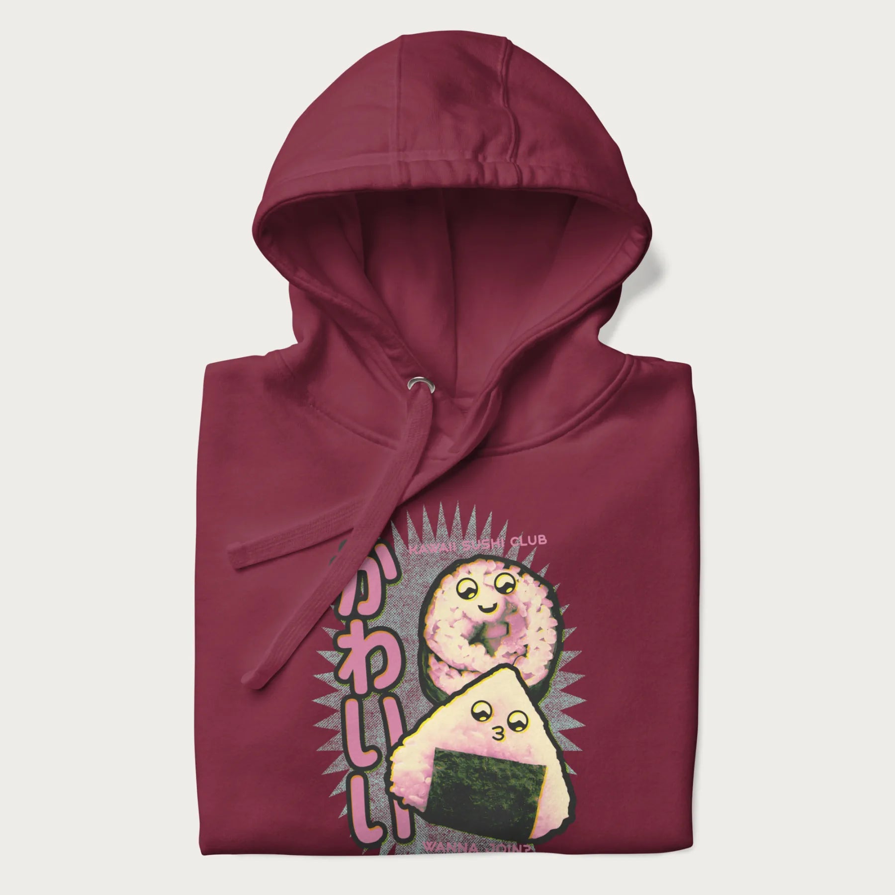 Folded maroon hoodie featuring a cute sushi and onigiri graphic with the text "Kawaii Sushi Club", colorful neon accents and Japanese characters.