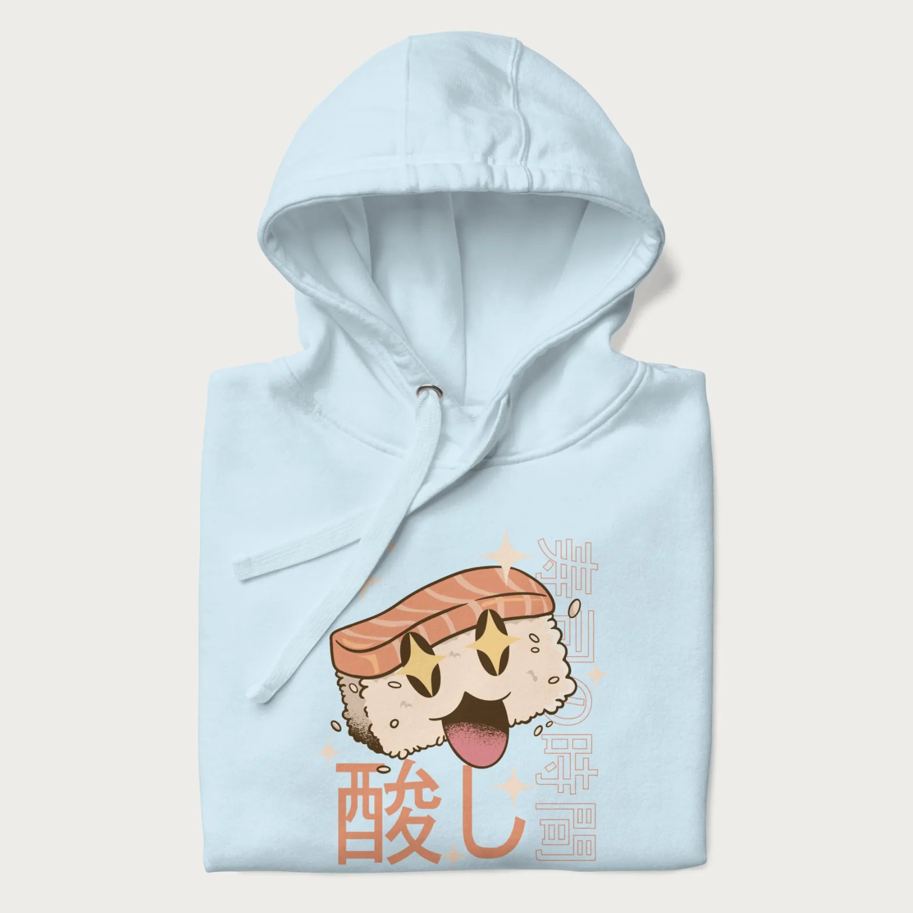 Folded light blue hoodie with Japanese graphic of a cute sushi with sparkling eyes accompanied by Japanese text '寿司の時間' (Sushi Time).