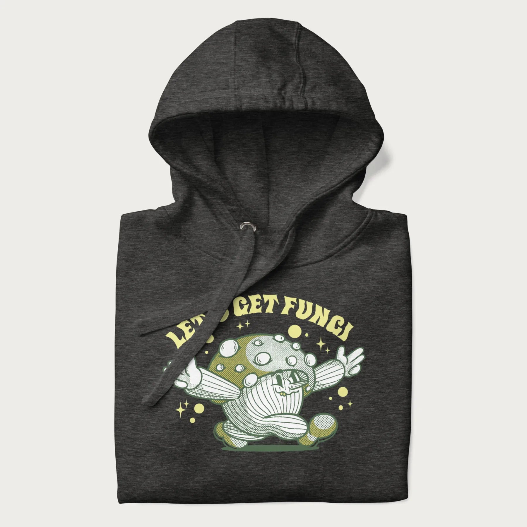 Folded dark grey hoodie with a retro-inspired graphic of a mushroom mascot character and the text 'Let's Get Fungi'.