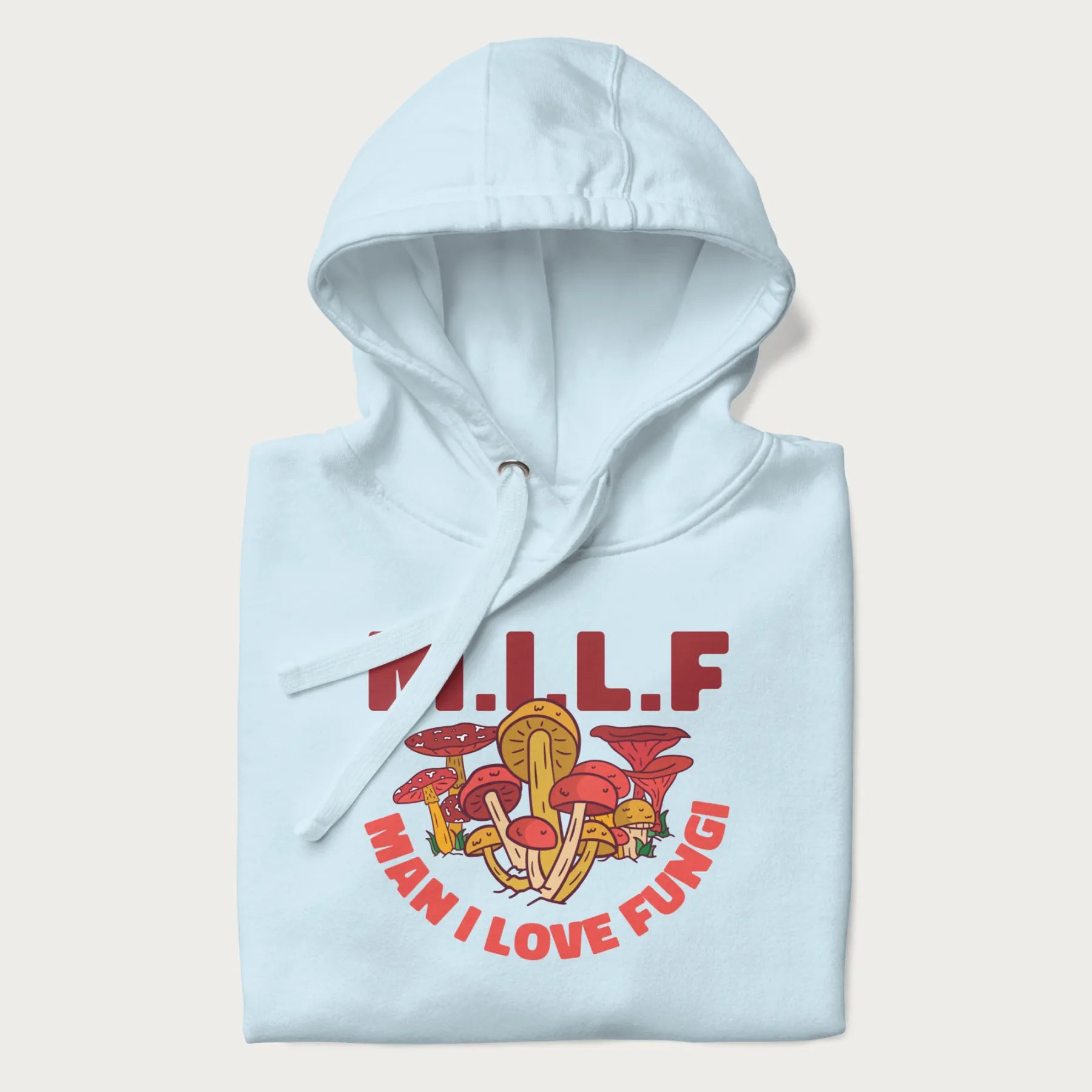 Folded light blue hoodie with a graphic of various mushrooms and the text 'M.I.L.F - Man I Love Fungi'.