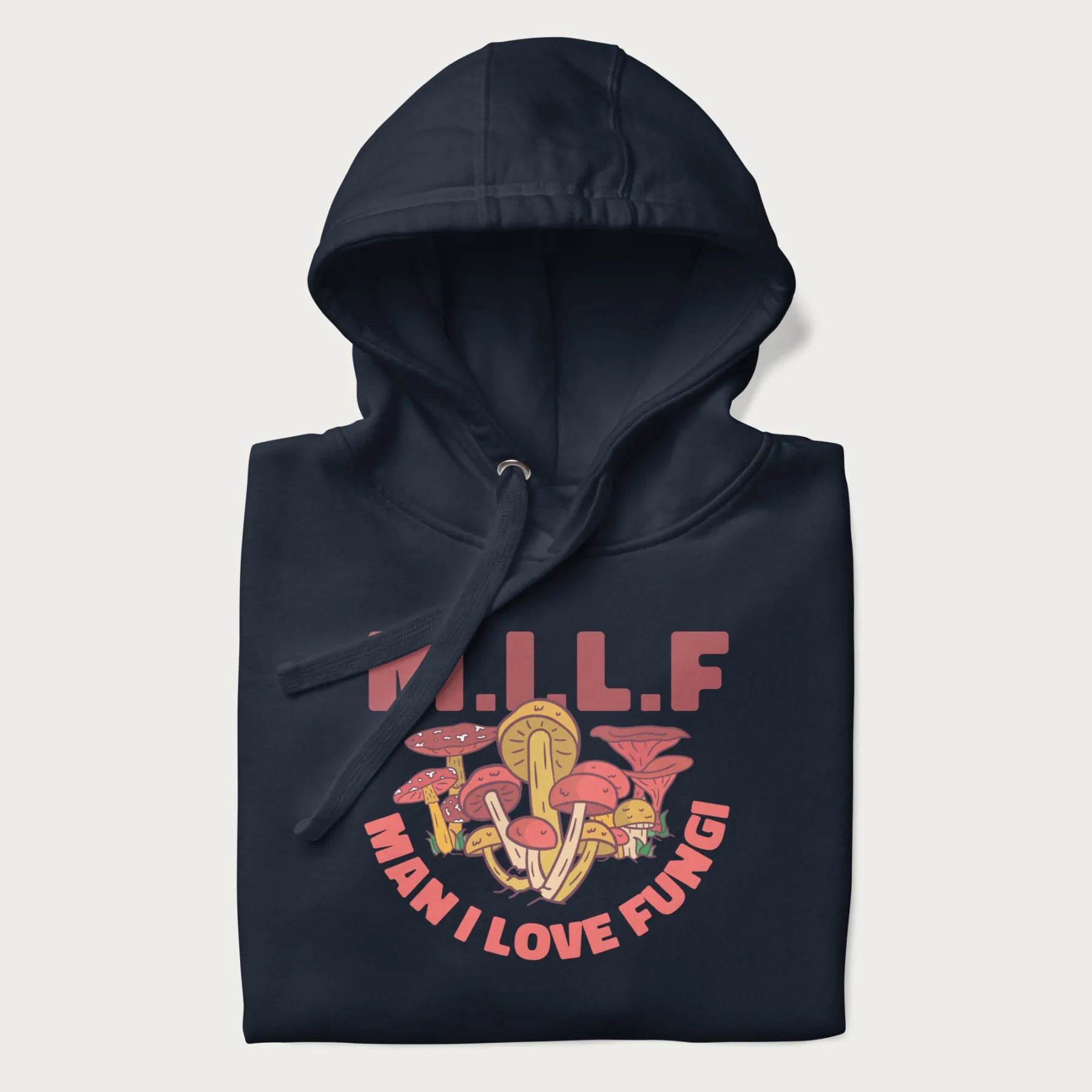 Folded navy blue hoodie with a graphic of various mushrooms and the text 'M.I.L.F - Man I Love Fungi'.