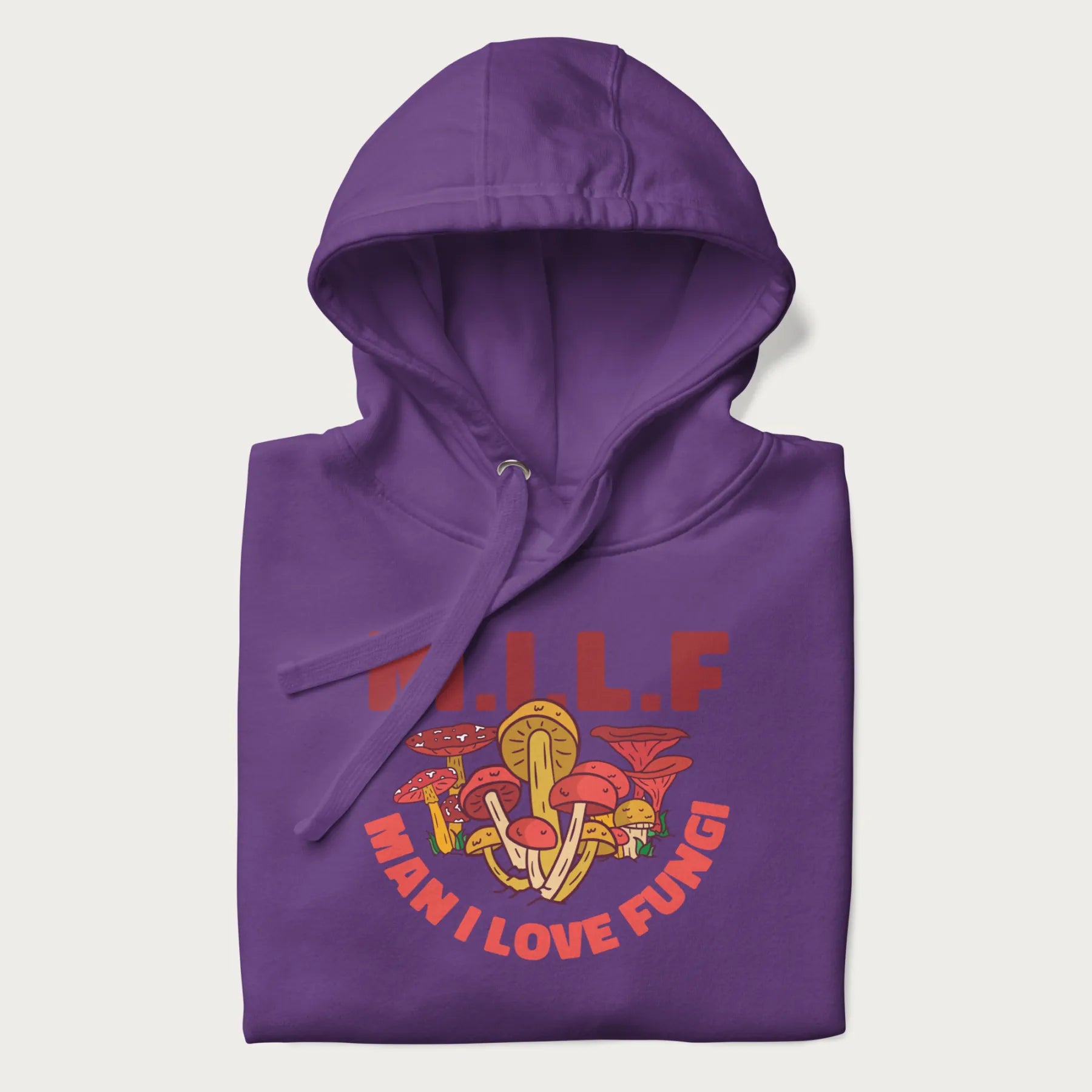 Folded purple hoodie with a graphic of various mushrooms and the text 'M.I.L.F - Man I Love Fungi'.