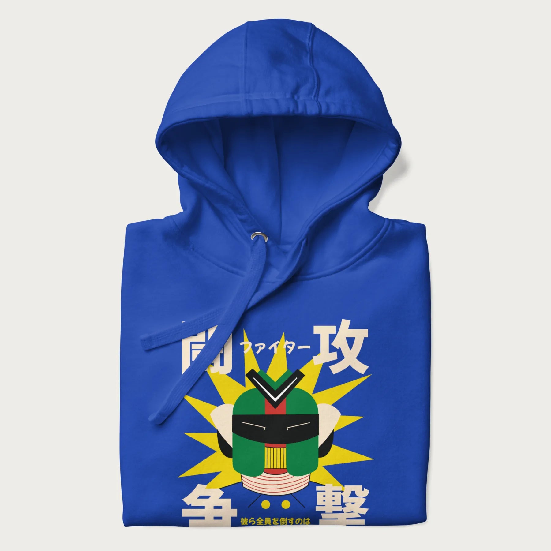 Folded royal blue hoodie with retro graphic of a mecha warrior and Japanese text for "Fight," "Attack," "Conflict," and "Destiny to defeat them all".