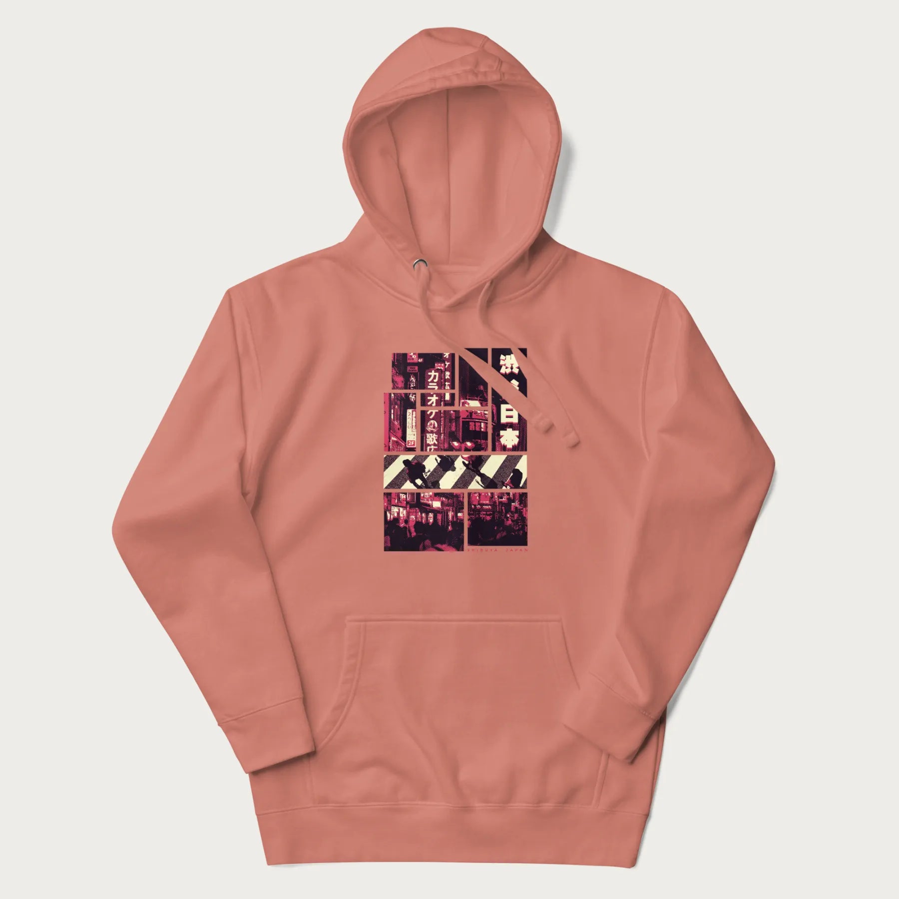 Light pink hoodie with Japanese graphic panels of Shibuya Crossing, Japanese text, and neon signs.