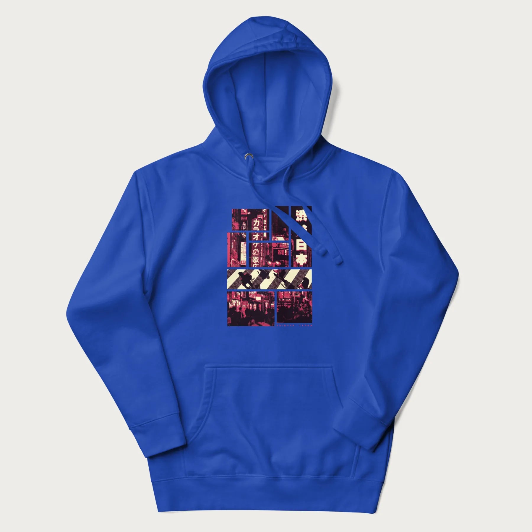 Royal blue hoodie with Japanese graphic panels of Shibuya Crossing, Japanese text, and neon signs.