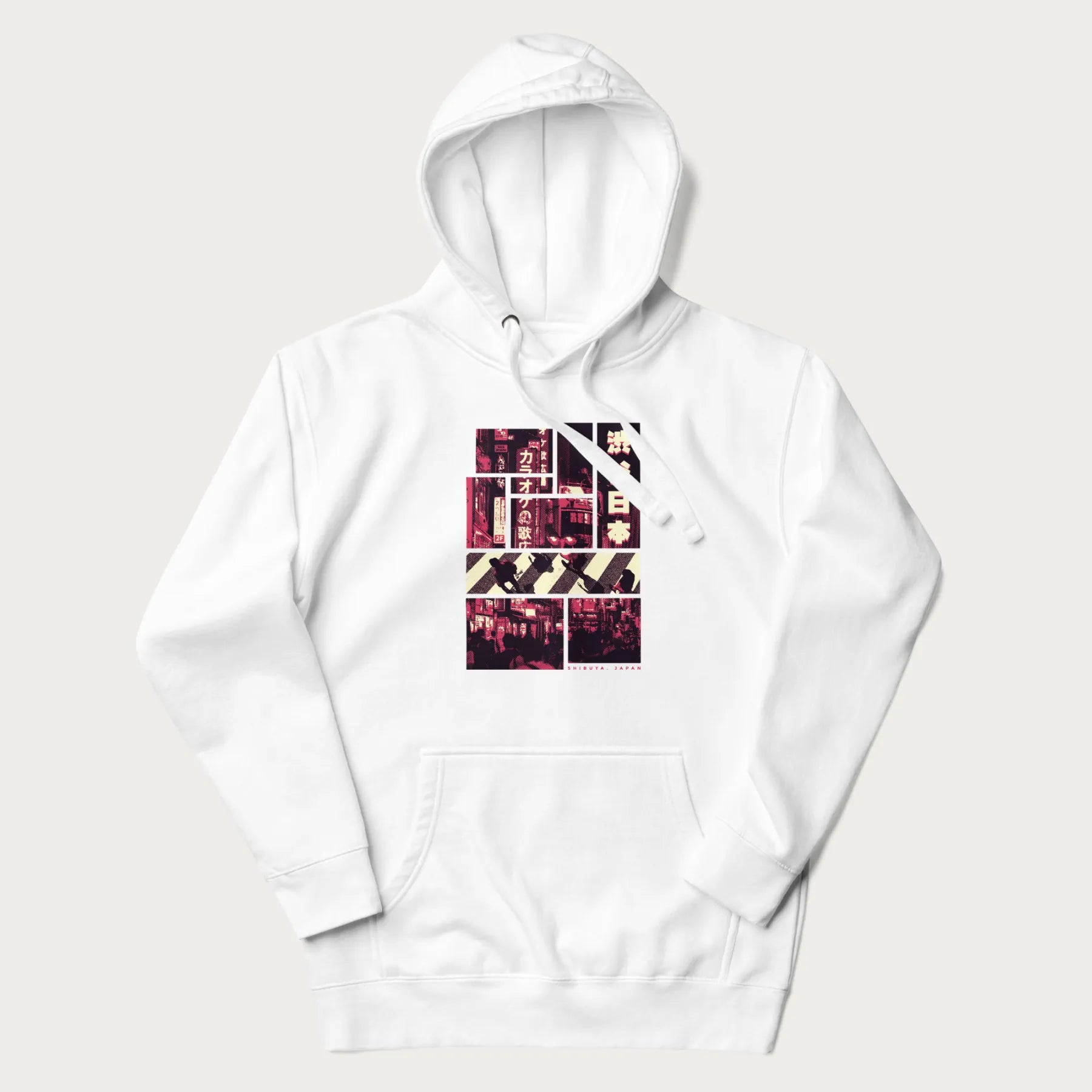 White hoodie with Japanese graphic panels of Shibuya Crossing, Japanese text, and neon signs.