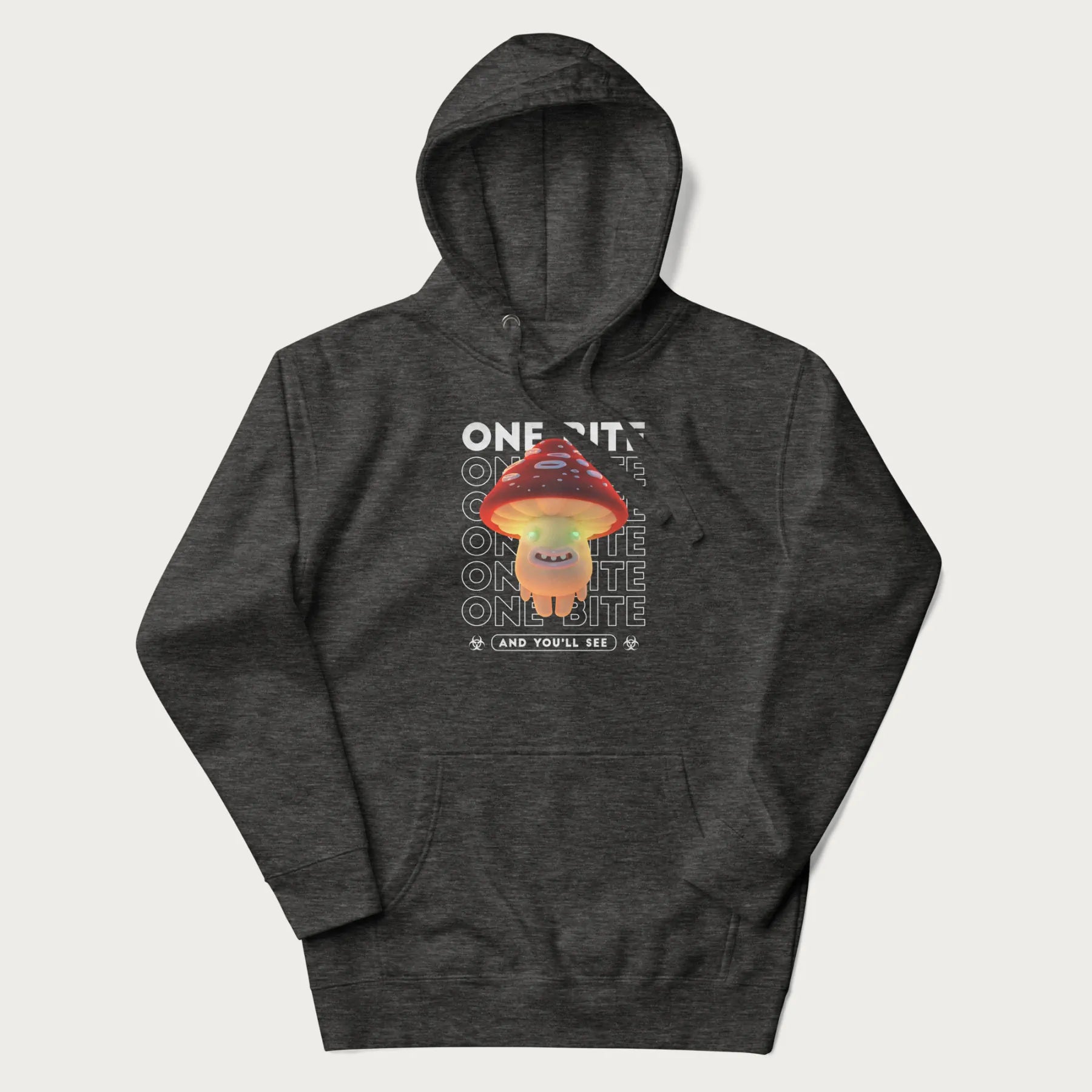 Dark grey hoodie with a graphic of a glowing, cartoon realistic mushroom character and the text 'One Bite And You'll See'.