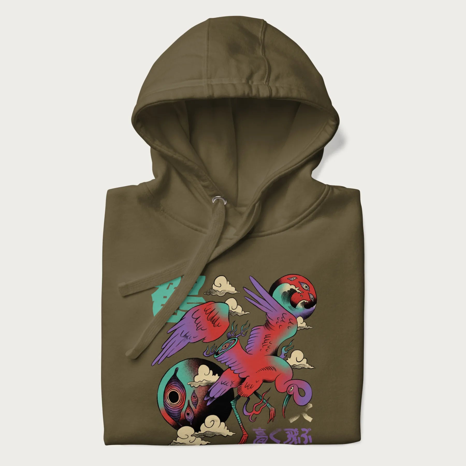 Folded military green hoodie with Japanese crane graphic in vibrant colors and Japanese text '鶴' (Crane) and '高く飛ぶ' (Fly High).
