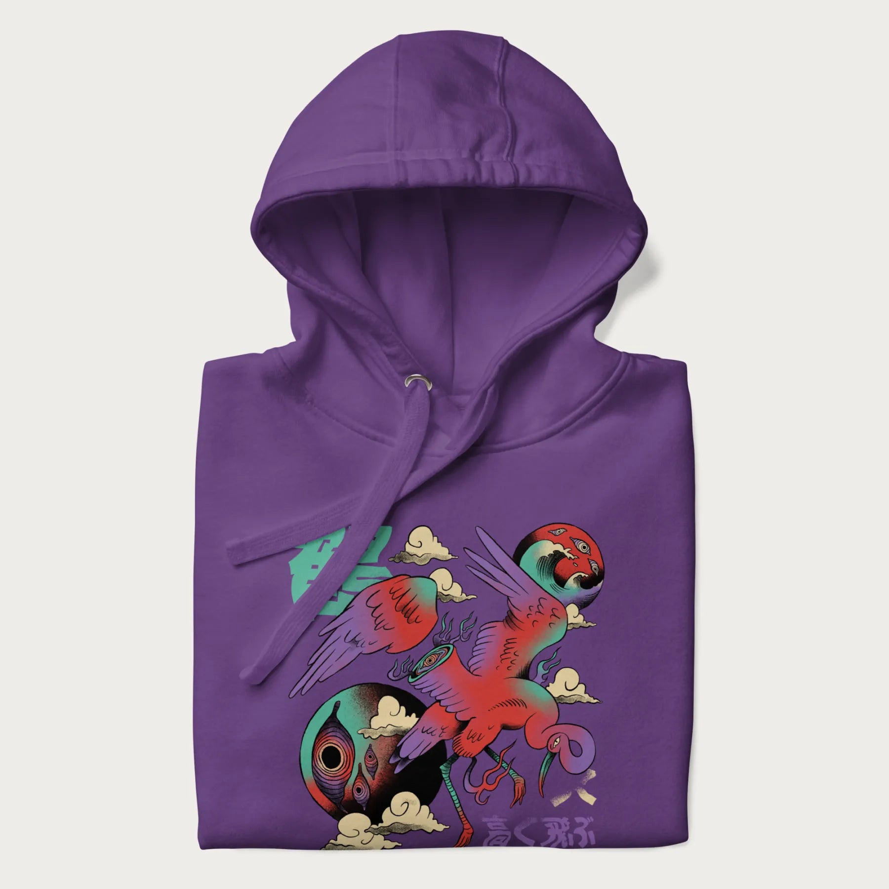 Folded purple hoodie with Japanese crane graphic in vibrant colors and Japanese text '鶴' (Crane) and '高く飛ぶ' (Fly High).