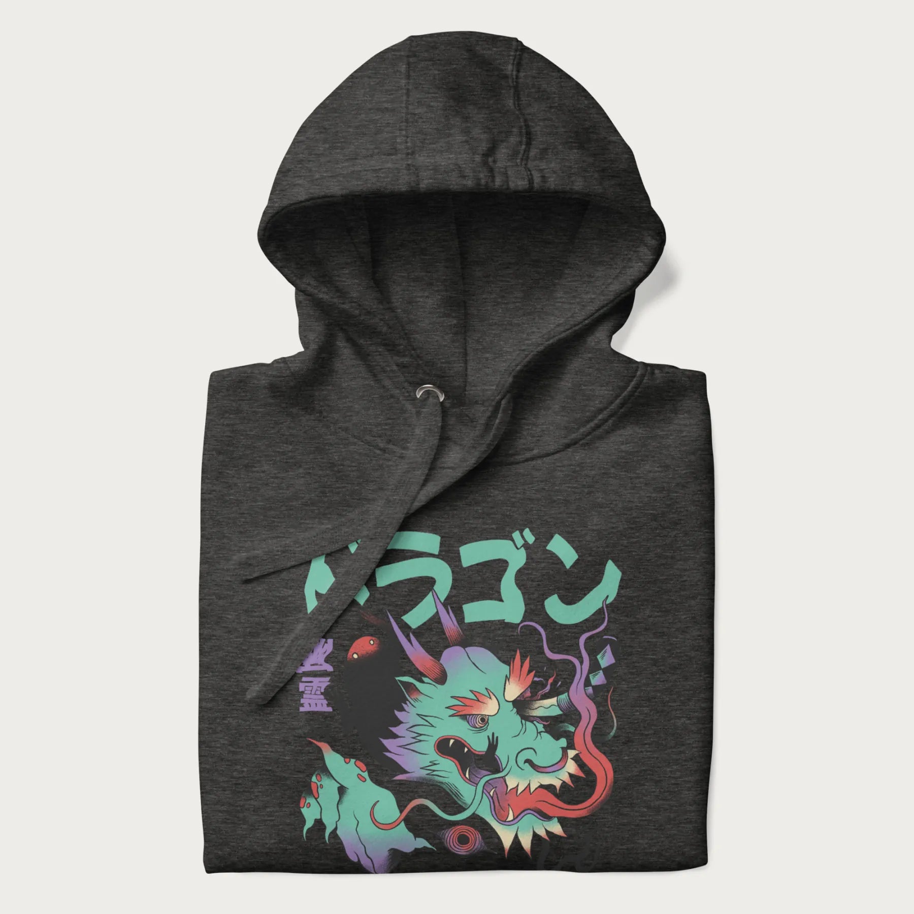 Folded dark grey hoodie with Japanese dragon psychedelic graphic and Japanese text 'ドラゴン' (Dragon) and '幽霊' (Ghost) in stylized fonts.