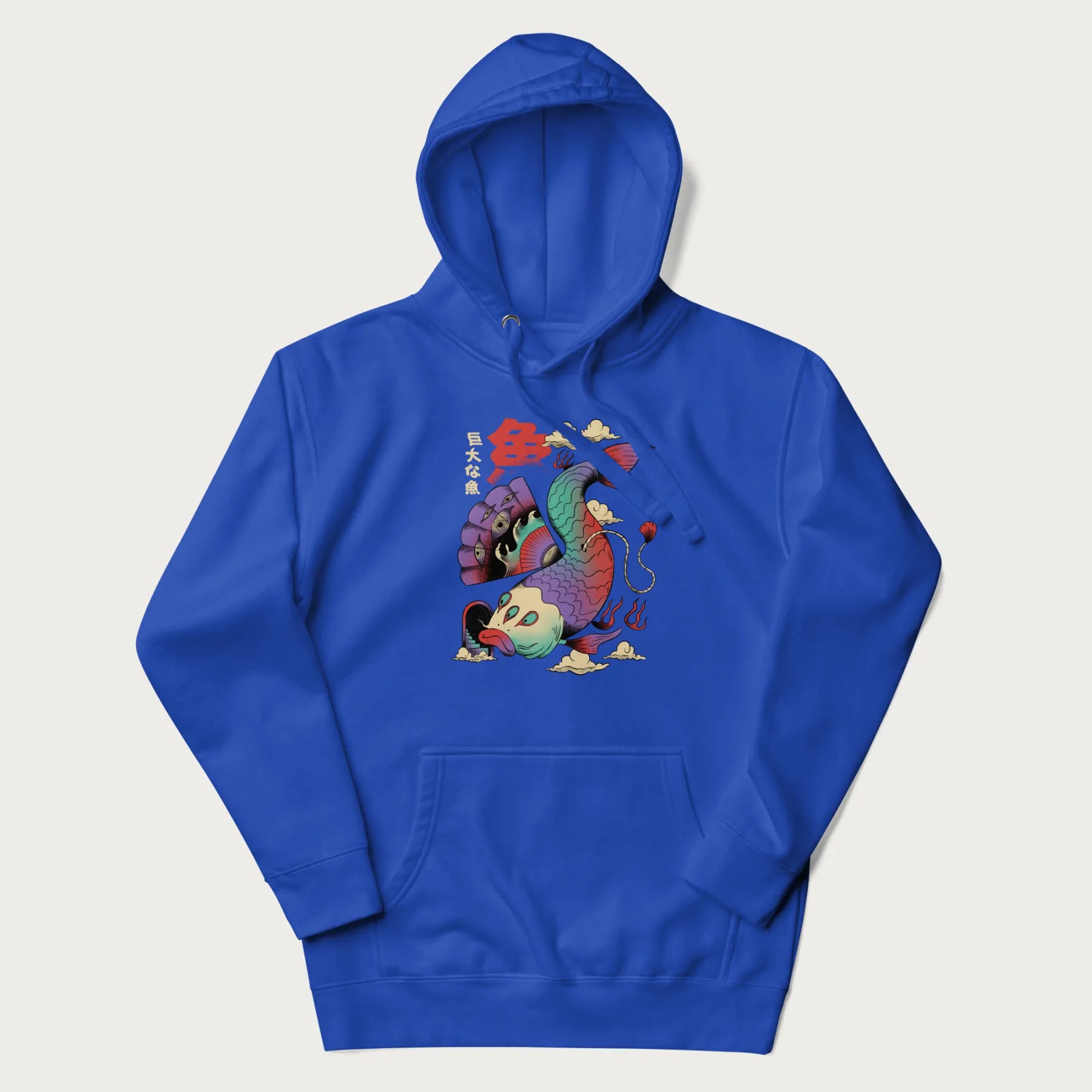 Royal blue hoodie with Japanese graphic of a colorful psychedelic koi fish, with Japanese text '魚' (Fish) and '巨大な魚' (Giant Fish).