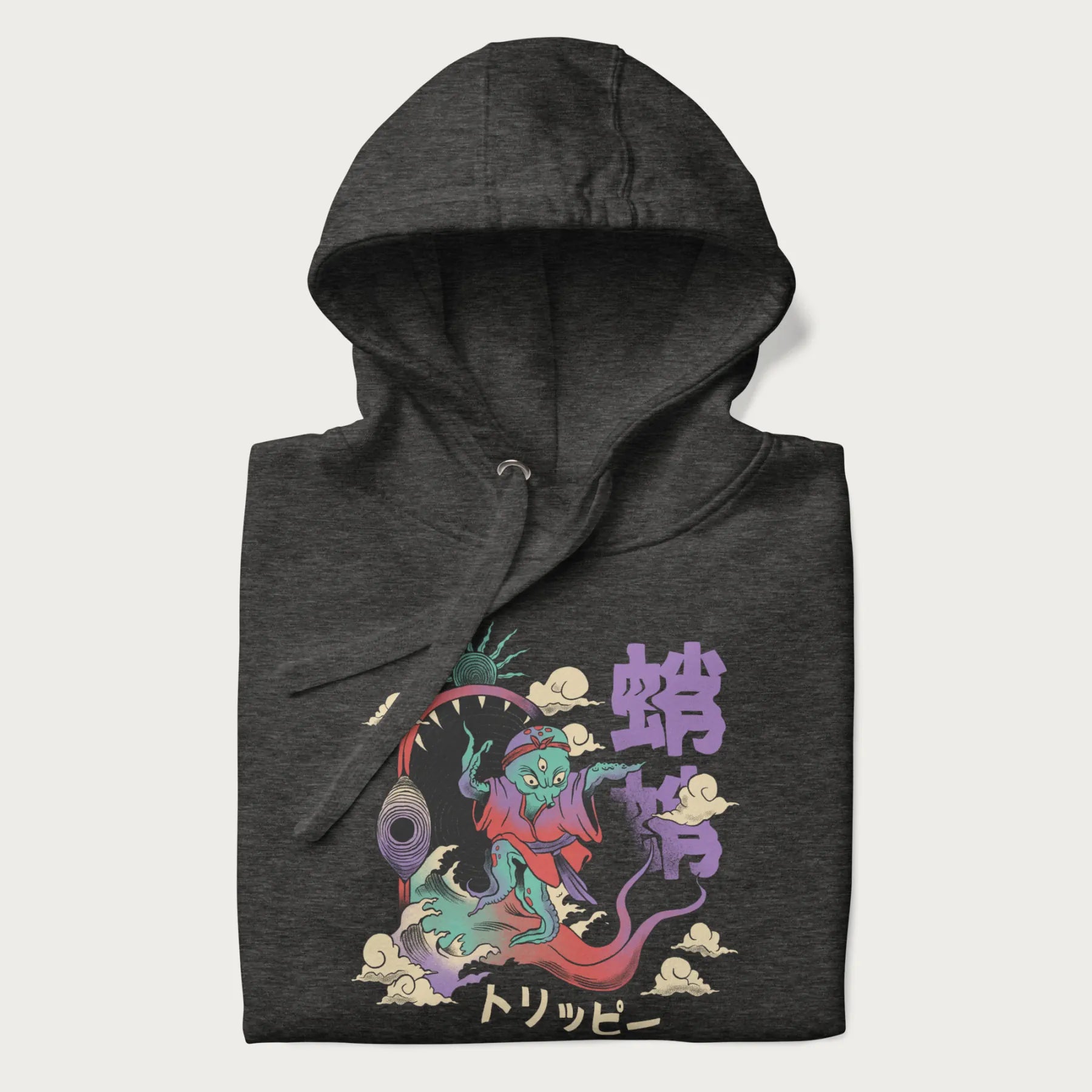 Folded dark grey hoodie with Japanese graphic of a colorful psychedelic octopus, with Japanese text '蛸' (Octopus) and 'トリッピー' (Trippy).