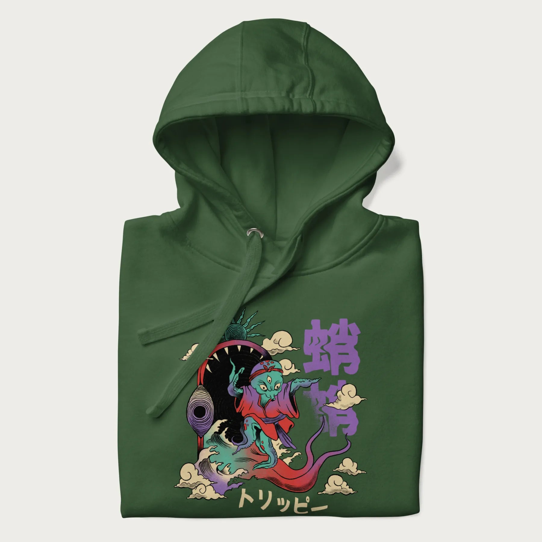 Folded forest green hoodie with Japanese graphic of a colorful psychedelic octopus, with Japanese text '蛸' (Octopus) and 'トリッピー' (Trippy).