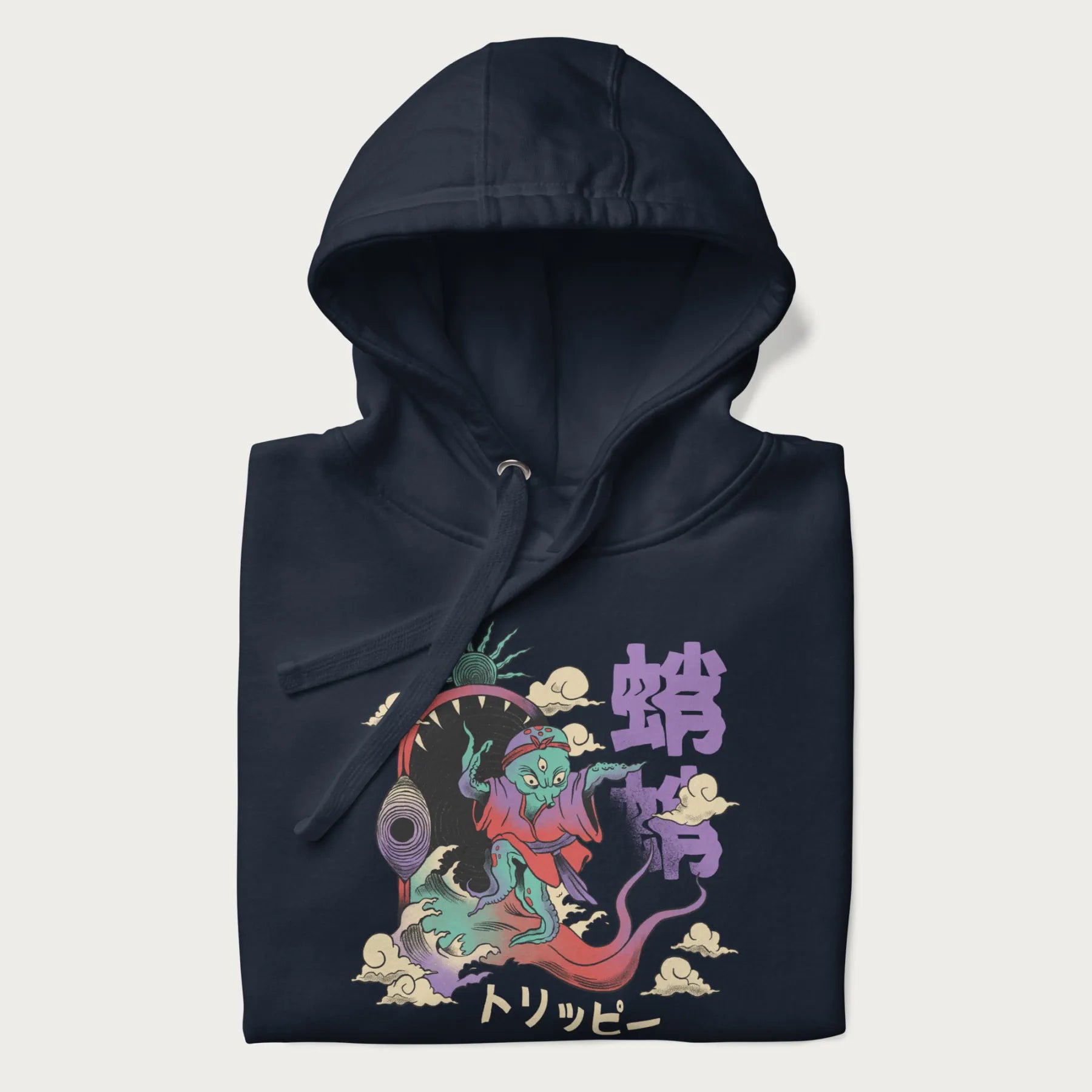 Folded navy blue hoodie with Japanese graphic of a colorful psychedelic octopus, with Japanese text '蛸' (Octopus) and 'トリッピー' (Trippy).
