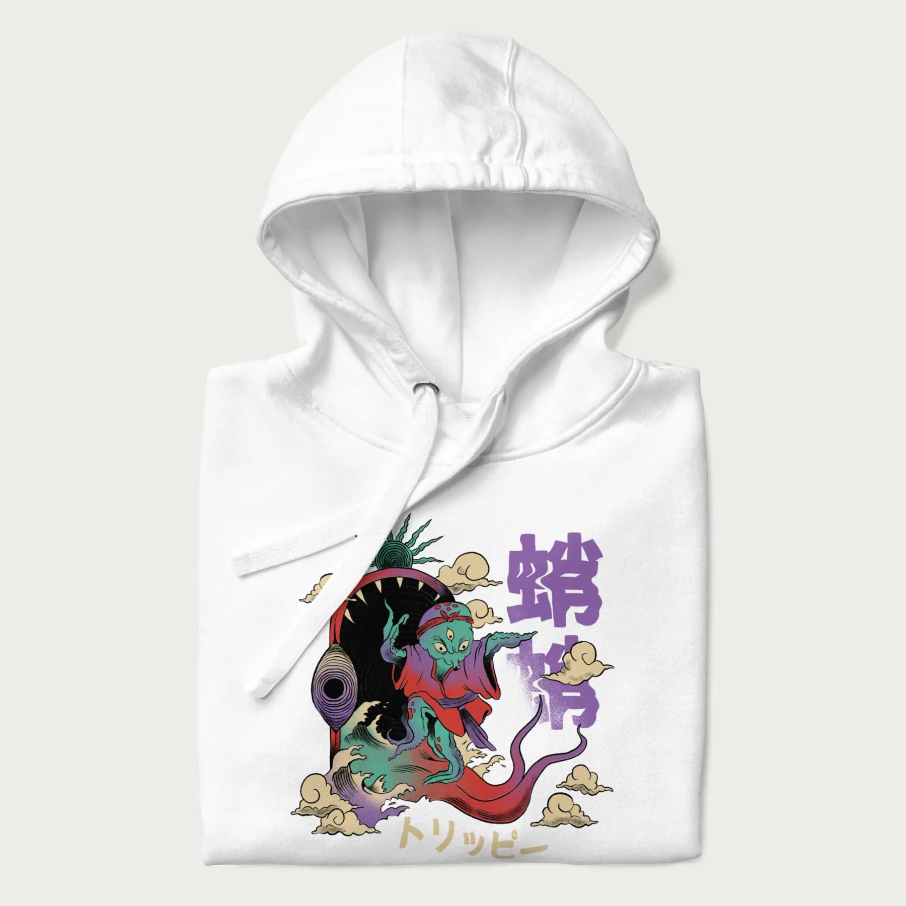 Folded white hoodie with Japanese graphic of a colorful psychedelic octopus, with Japanese text '蛸' (Octopus) and 'トリッピー' (Trippy).