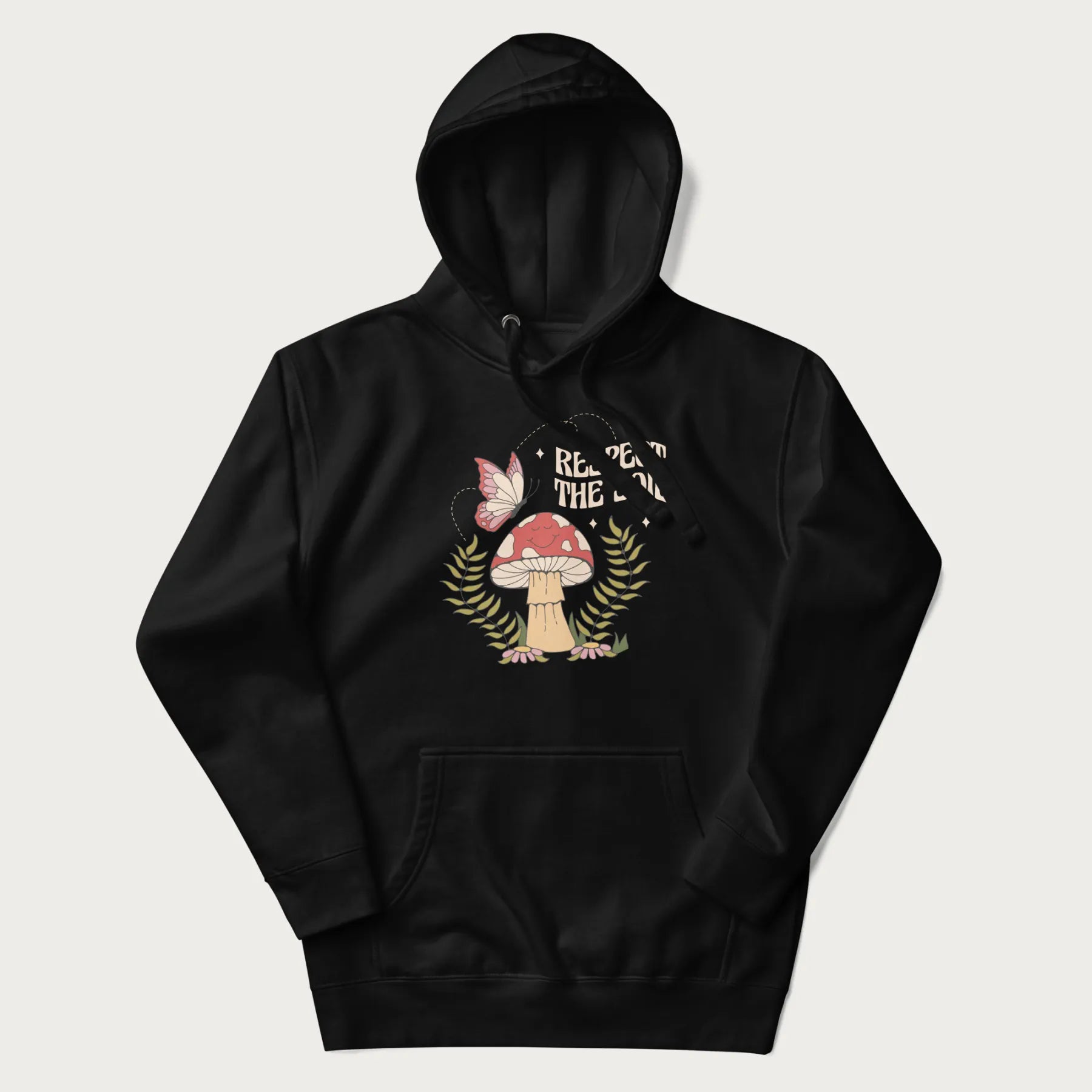Black hoodie with mushroom and butterfly design, with the text 'Respect the Soil' above it.