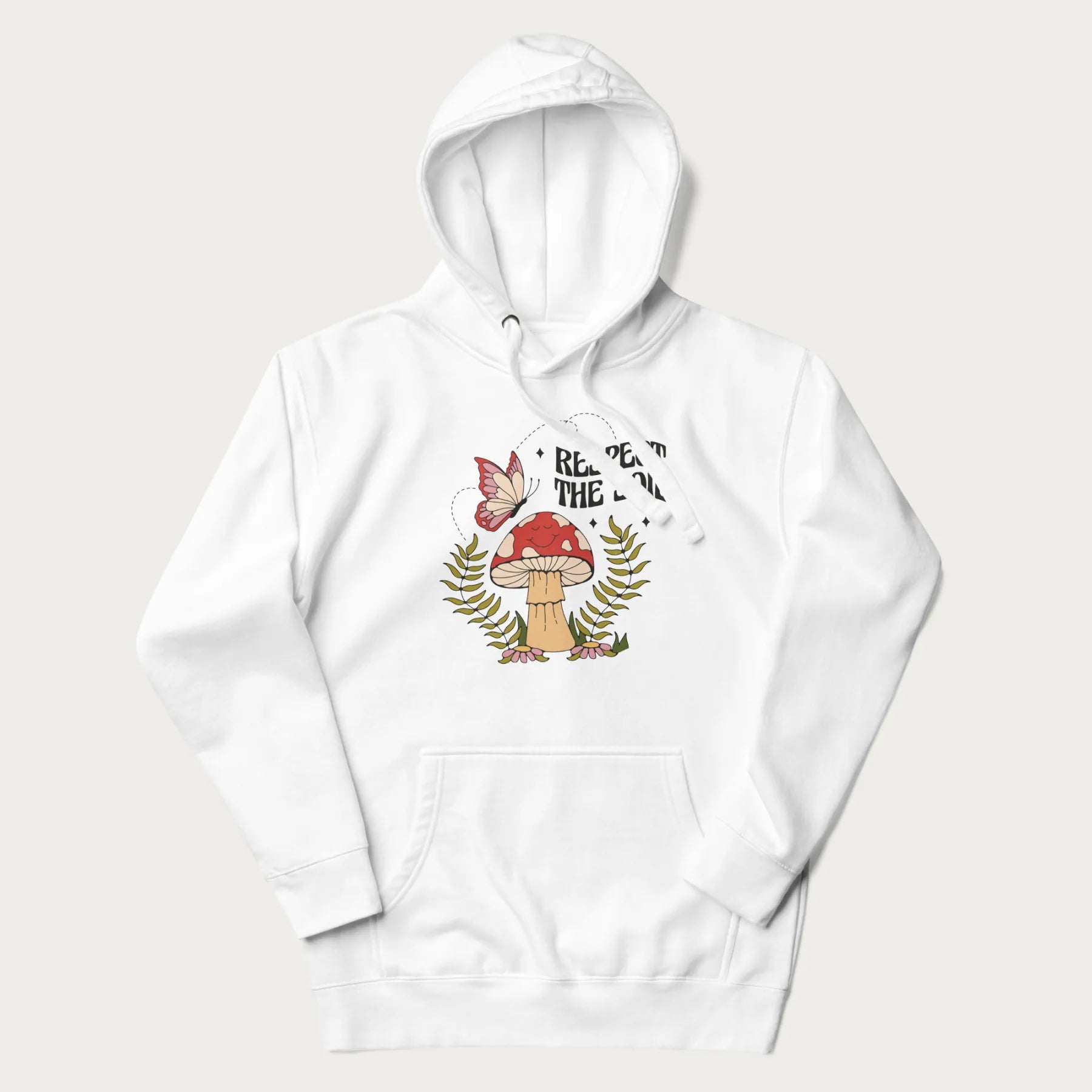 White hoodie with mushroom and butterfly design, with the text 'Respect the Soil' above it.