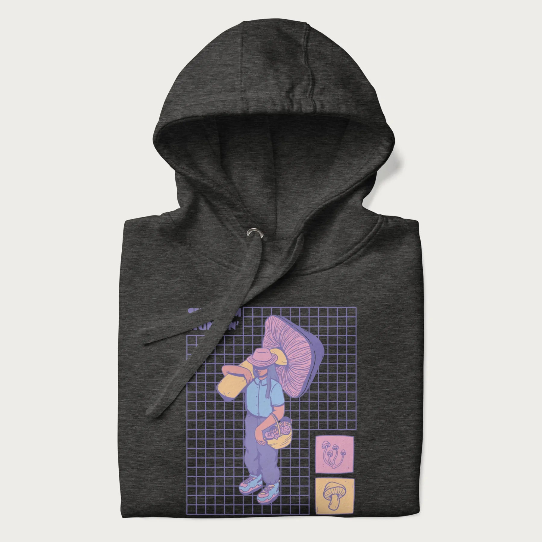 Folded dark grey hoodie featuring a graphic of a girl carrying a large mushroom and a basket of fungi, with the text "Shroom Huntin'".