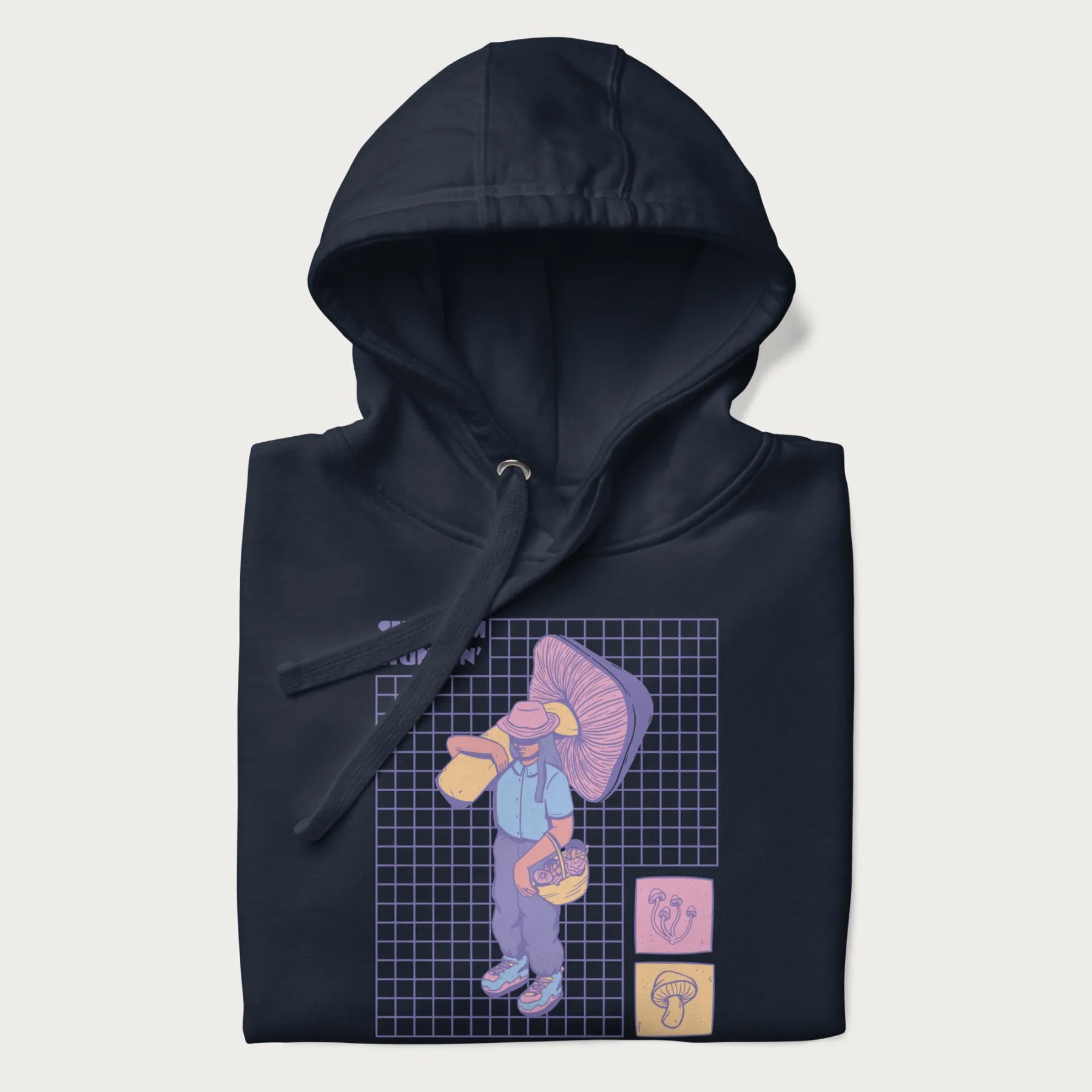 Folded navy blue hoodie featuring a graphic of a girl carrying a large mushroom and a basket of fungi, with the text "Shroom Huntin'".