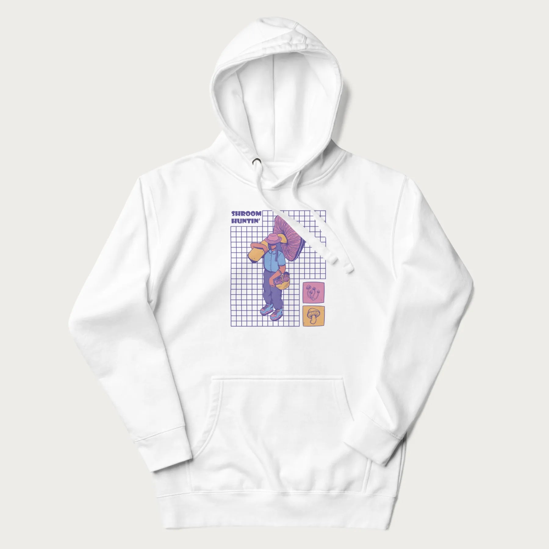 White hoodie featuring a graphic of a girl carrying a large mushroom and a basket of fungi, with the text "Shroom Huntin'".
