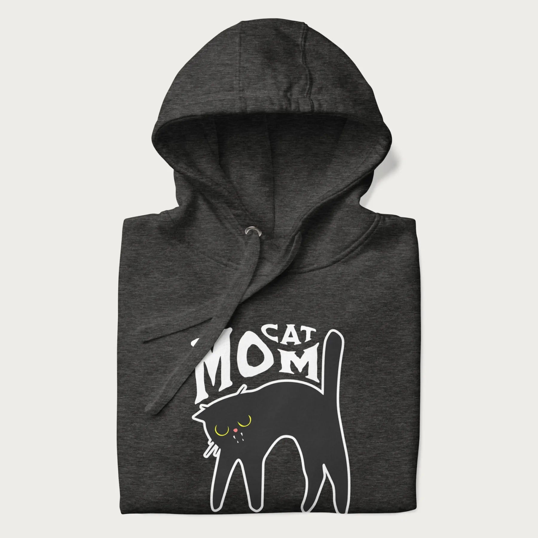 Folded dark grey hoodie with 'Cat Mom' in white lettering above a minimalistic graphic of a black cat with yellow eyes.