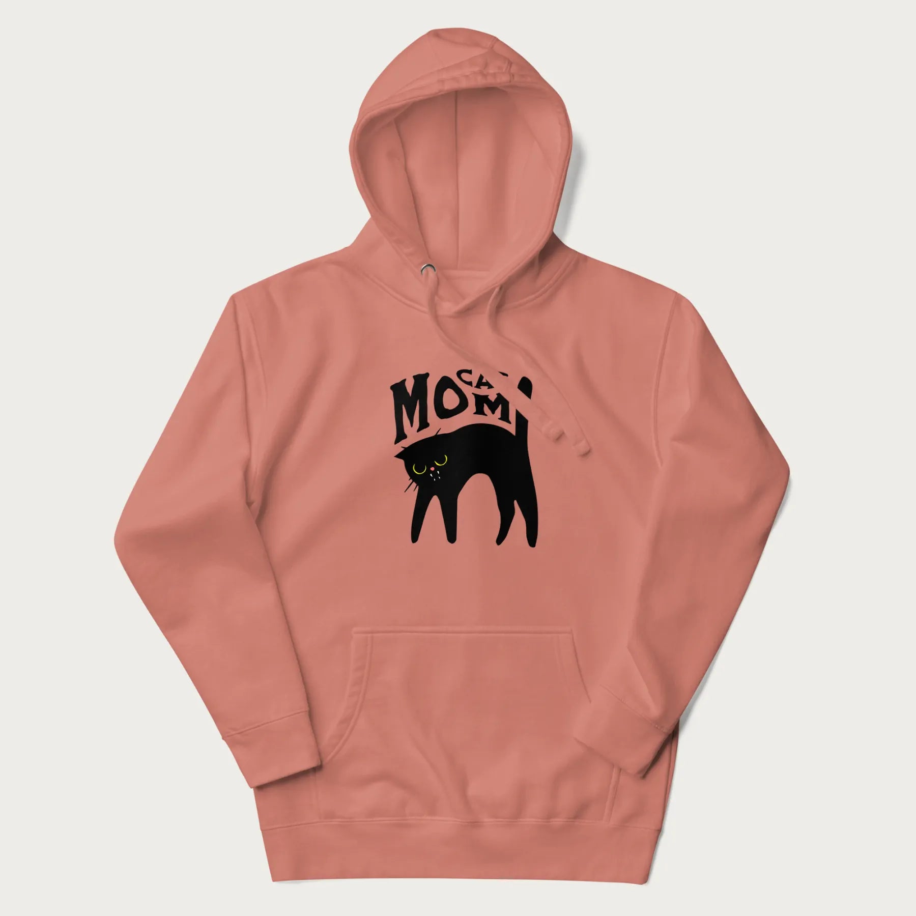 Light pink hoodie with 'Cat Mom' in black lettering above a minimalistic graphic of a black cat with yellow eyes.