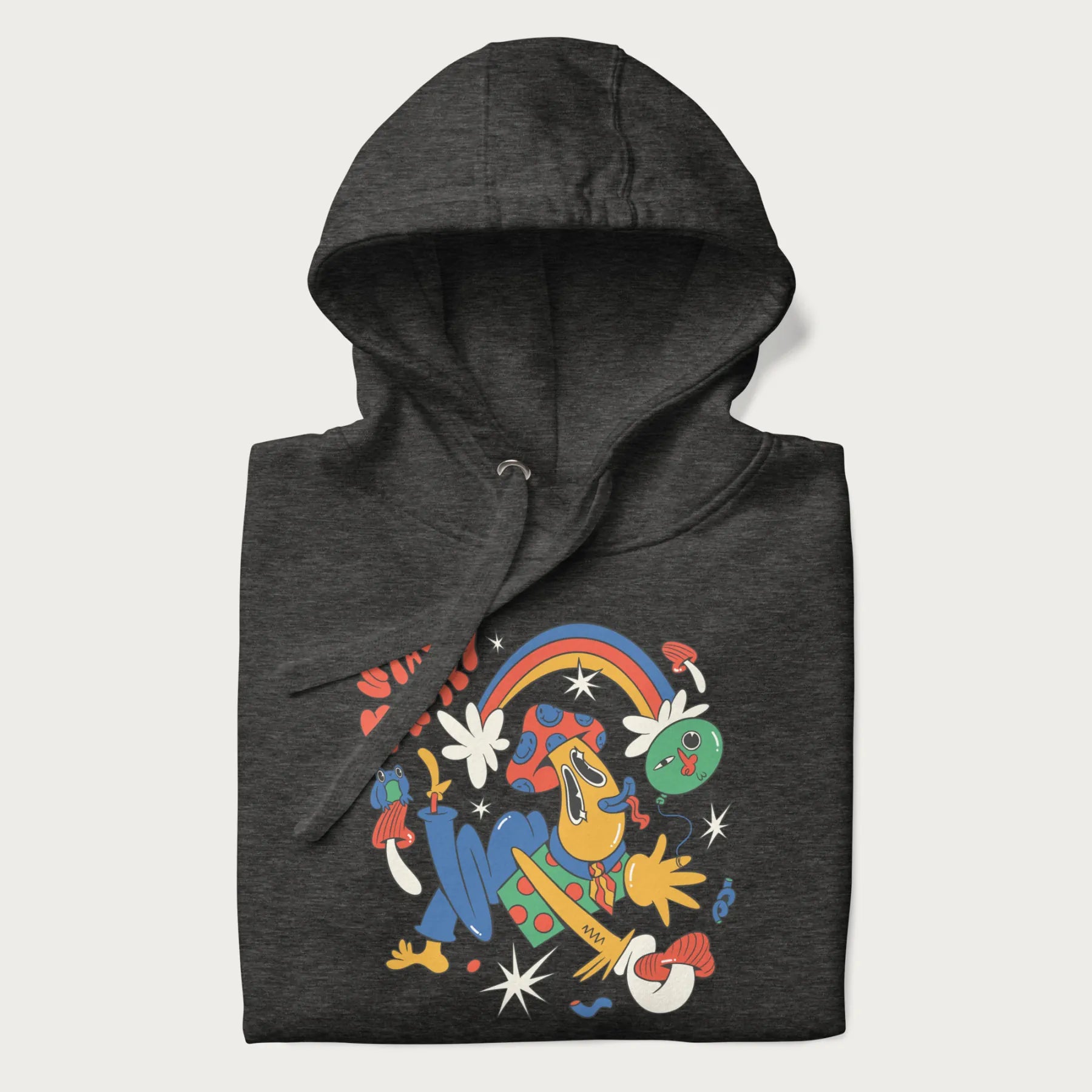Folded dark grey trippy hoodie featuring a colorful psychedelic design with playful characters and the text "Stay Trippy".
