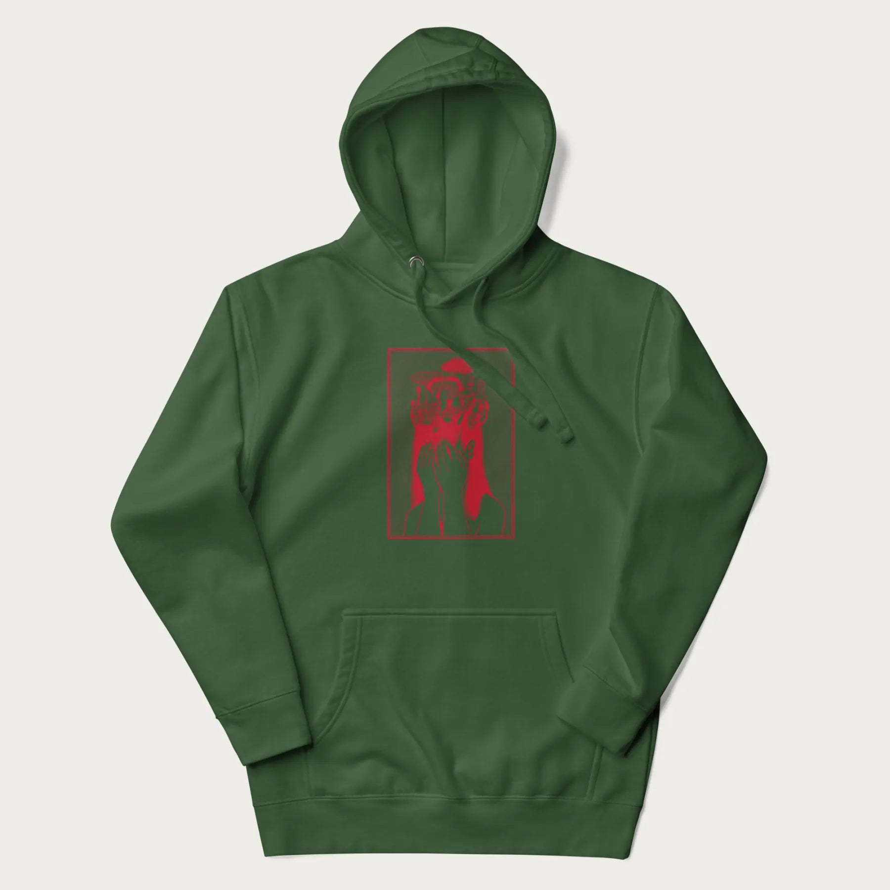 Forest green hoodie with a surreal red graphic of a girl with mushrooms growing from her head.