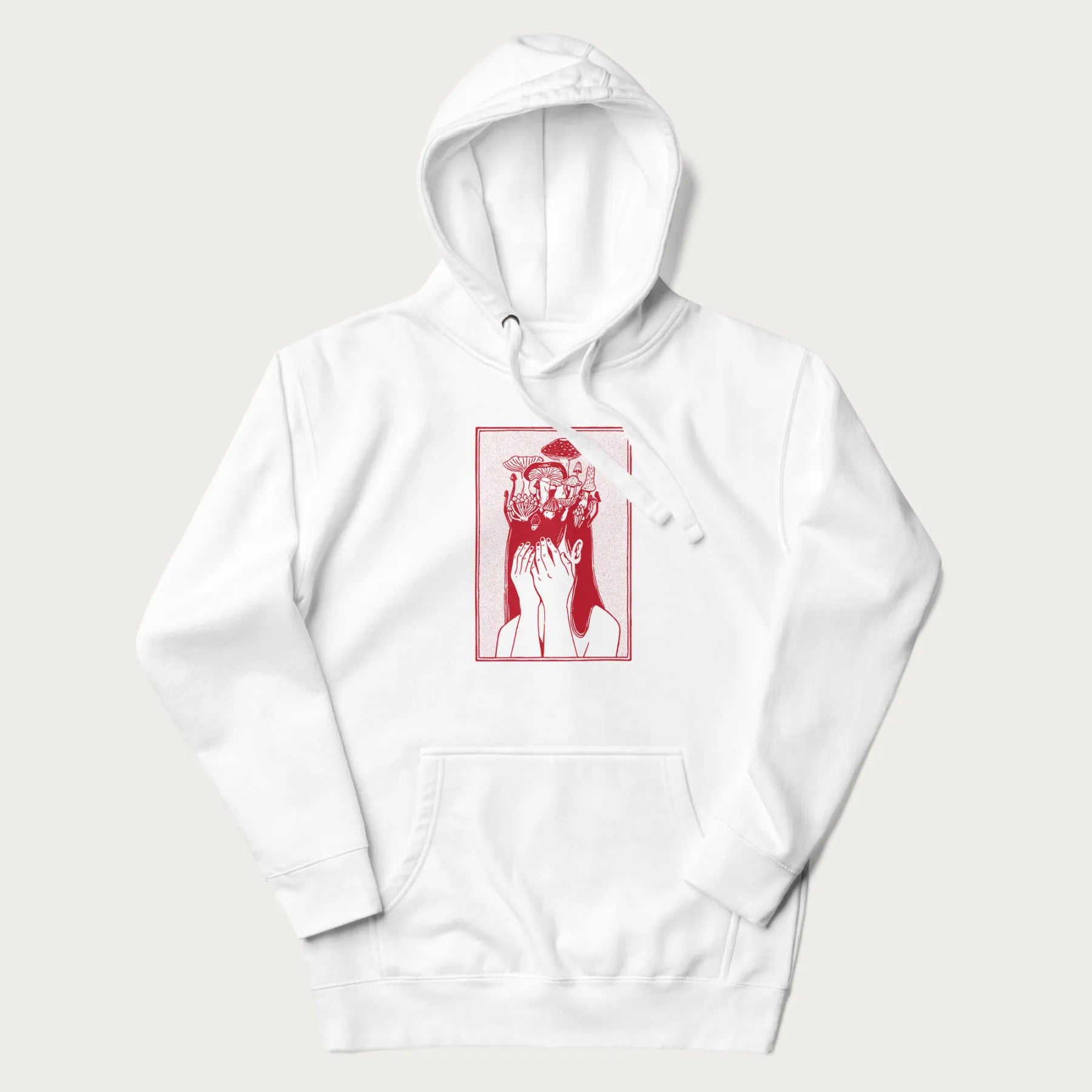 White hoodie with a surreal red graphic of a girl with mushrooms growing from her head.