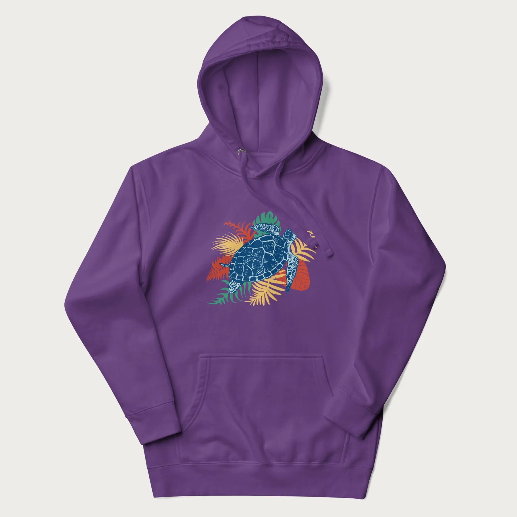 Purple hoodie with a vibrant graphic of a blue sea turtle and colorful tropical leaves.