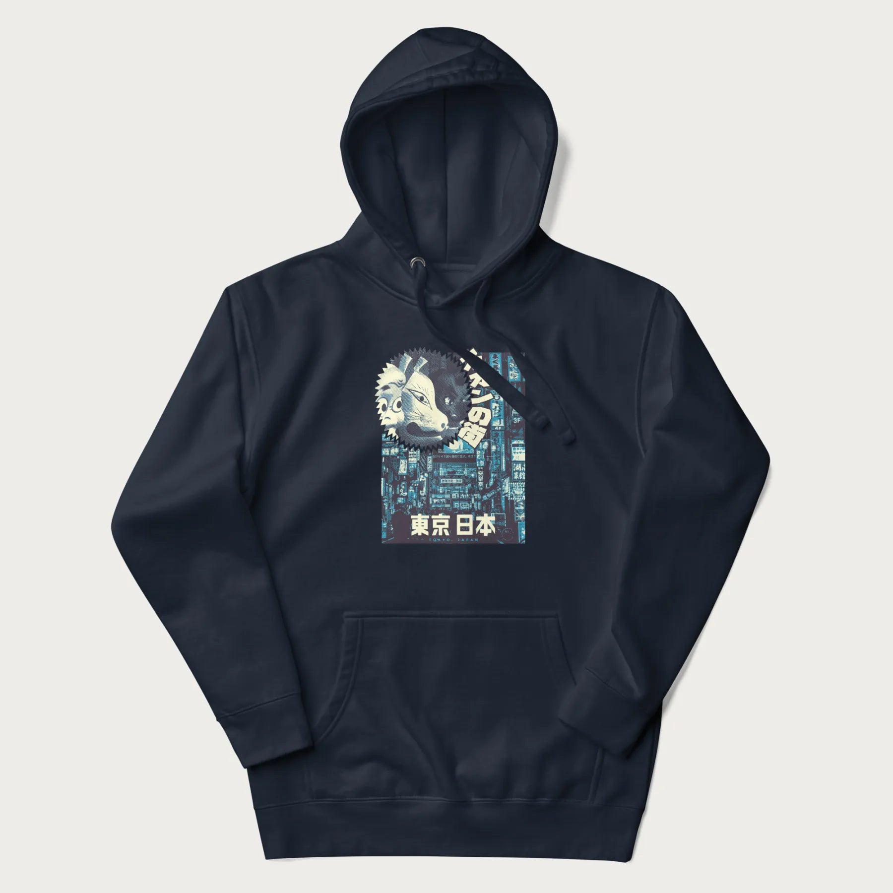 Navy blue hoodie with Japanese text '東京日本' translating to 'Tokyo, Japan', with three traditional Japanese masks over a neon-lit Tokyo background.