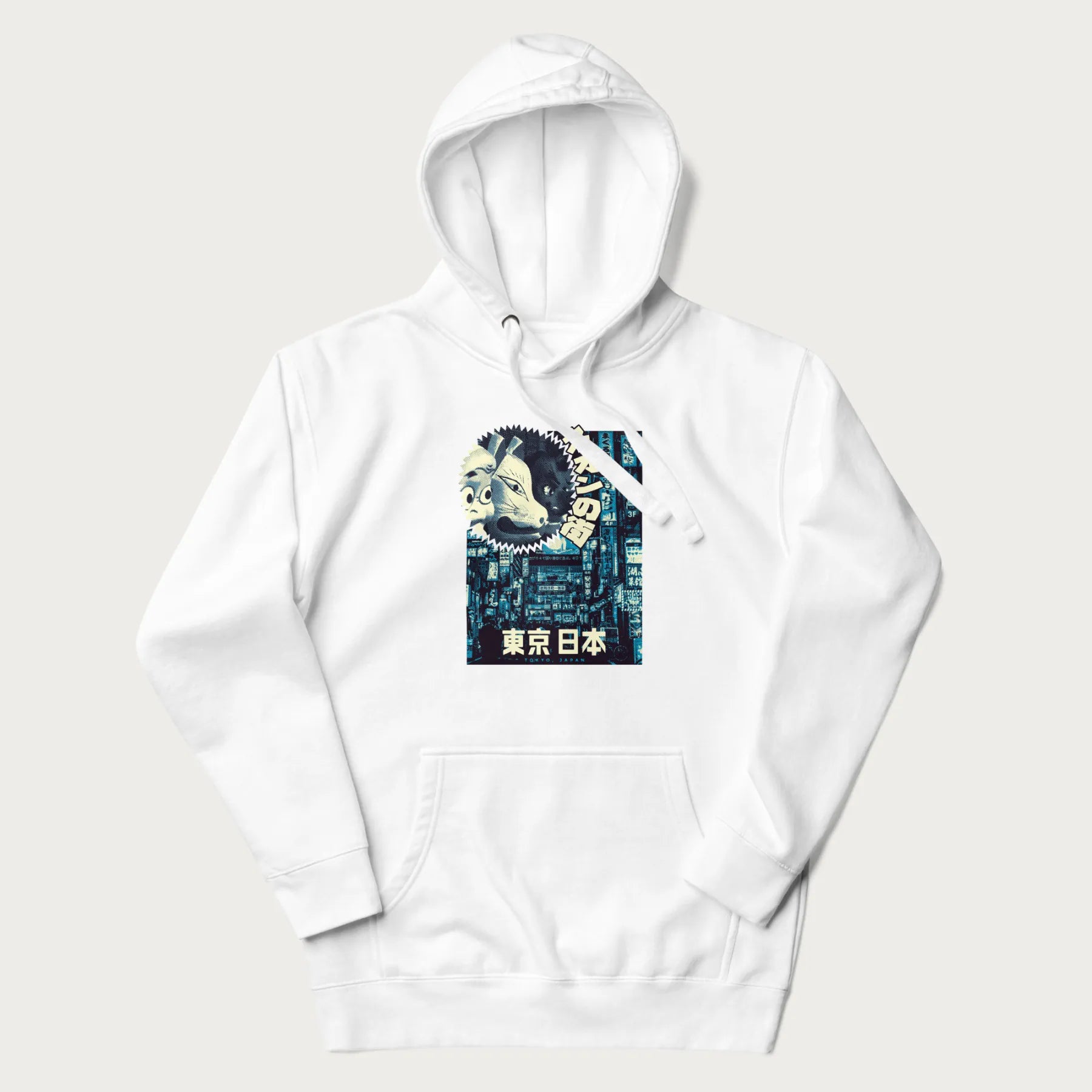 White hoodie with Japanese text '東京日本' translating to 'Tokyo, Japan', with three traditional Japanese masks over a neon-lit Tokyo background.