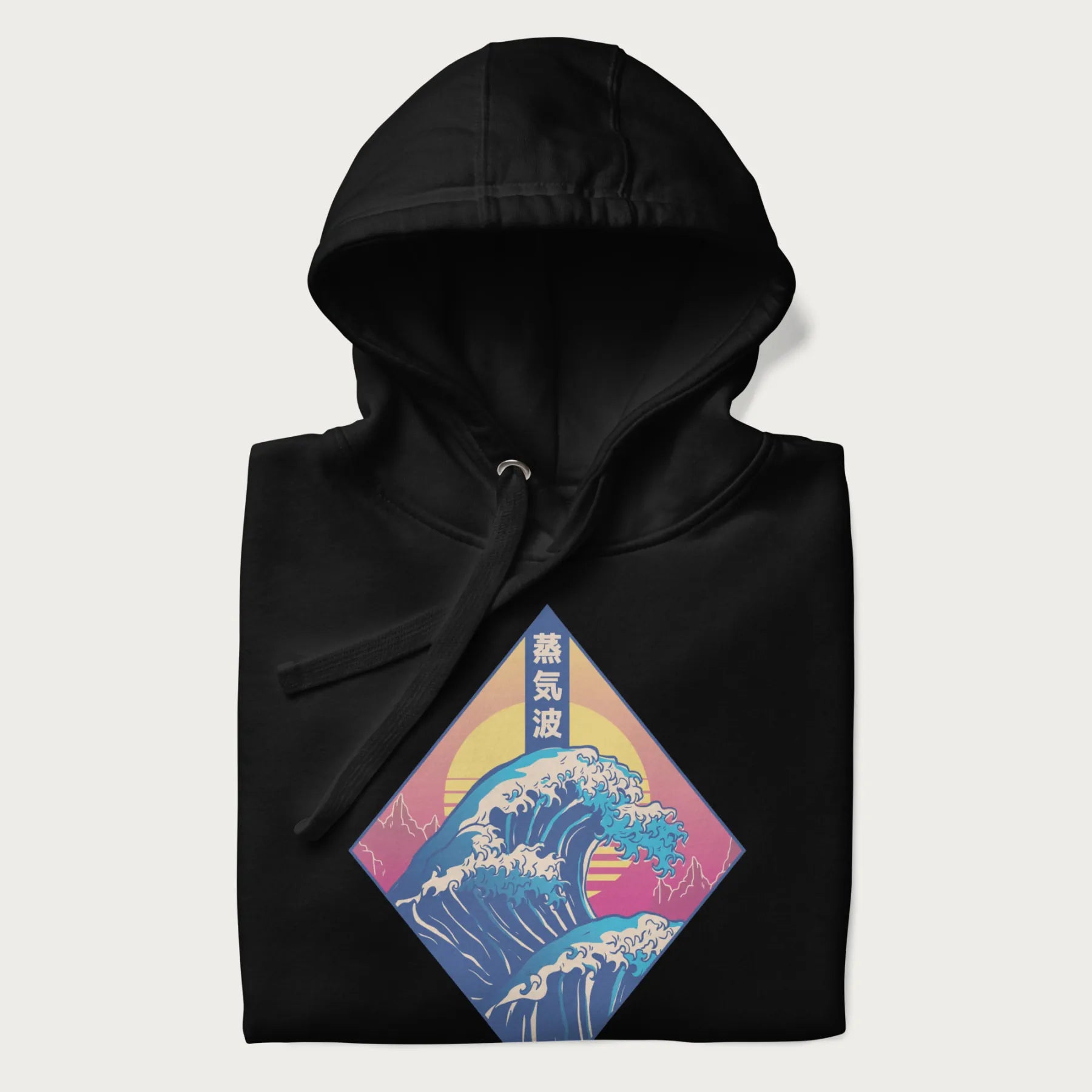 Folded black hoodie with Japanese 'Great Wave' graphic print in vaporwave style, rendered in bright, psychedelic colors in diamond-shaped layout.