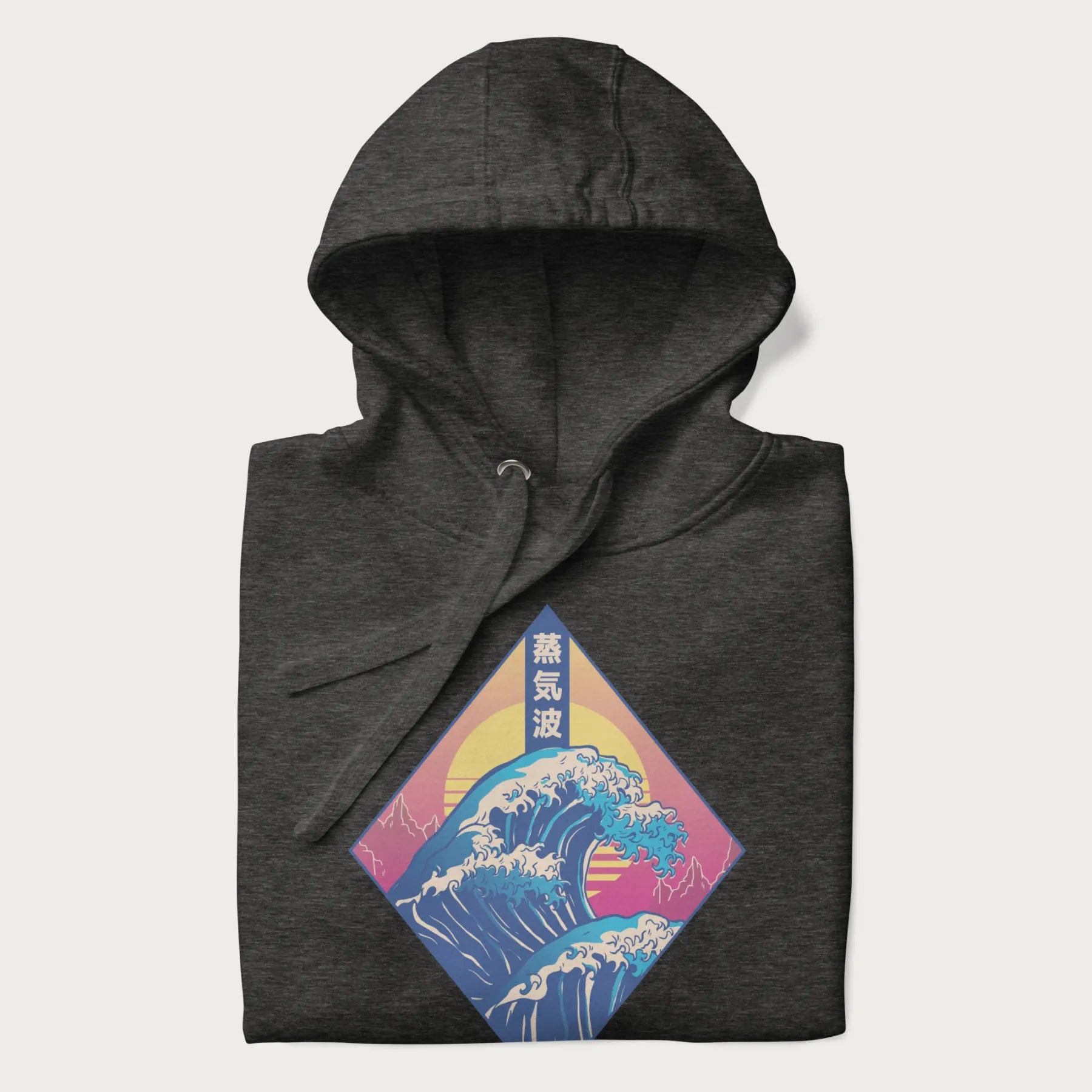 Folded dark grey hoodie with Japanese 'Great Wave' graphic print in vaporwave style, rendered in bright, psychedelic colors in diamond-shaped layout.