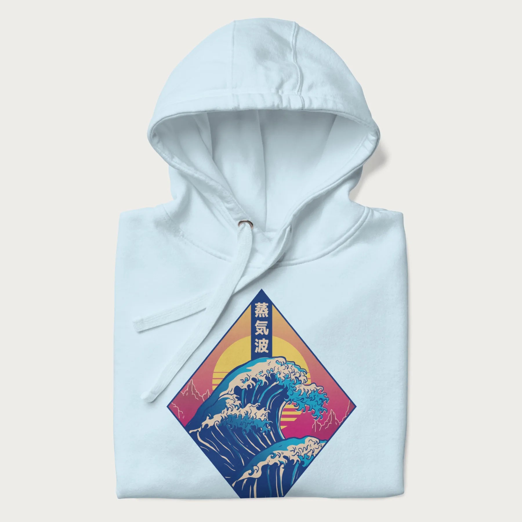 Folded light blue hoodie with Japanese 'Great Wave' graphic print in vaporwave style, rendered in bright, psychedelic colors in diamond-shaped layout.