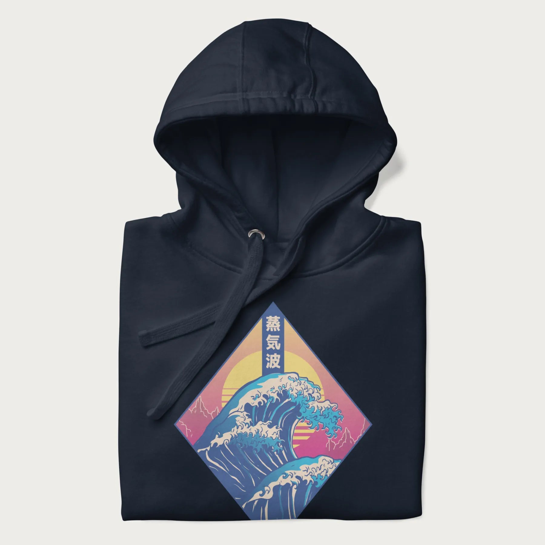 Folded navy blue hoodie with Japanese 'Great Wave' graphic print in vaporwave style, rendered in bright, psychedelic colors in diamond-shaped layout.
