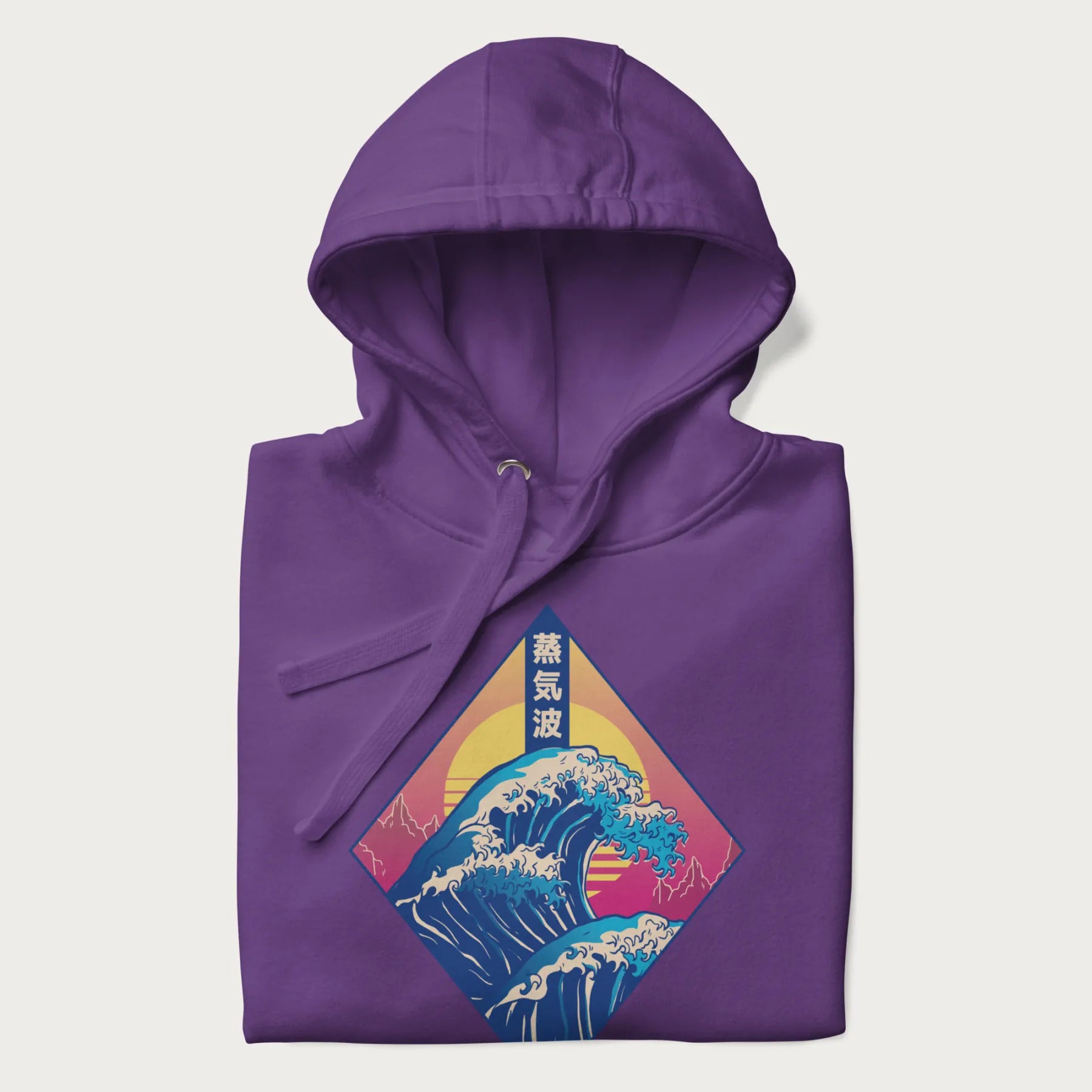 Folded purple hoodie with Japanese 'Great Wave' graphic print in vaporwave style, rendered in bright, psychedelic colors in diamond-shaped layout.