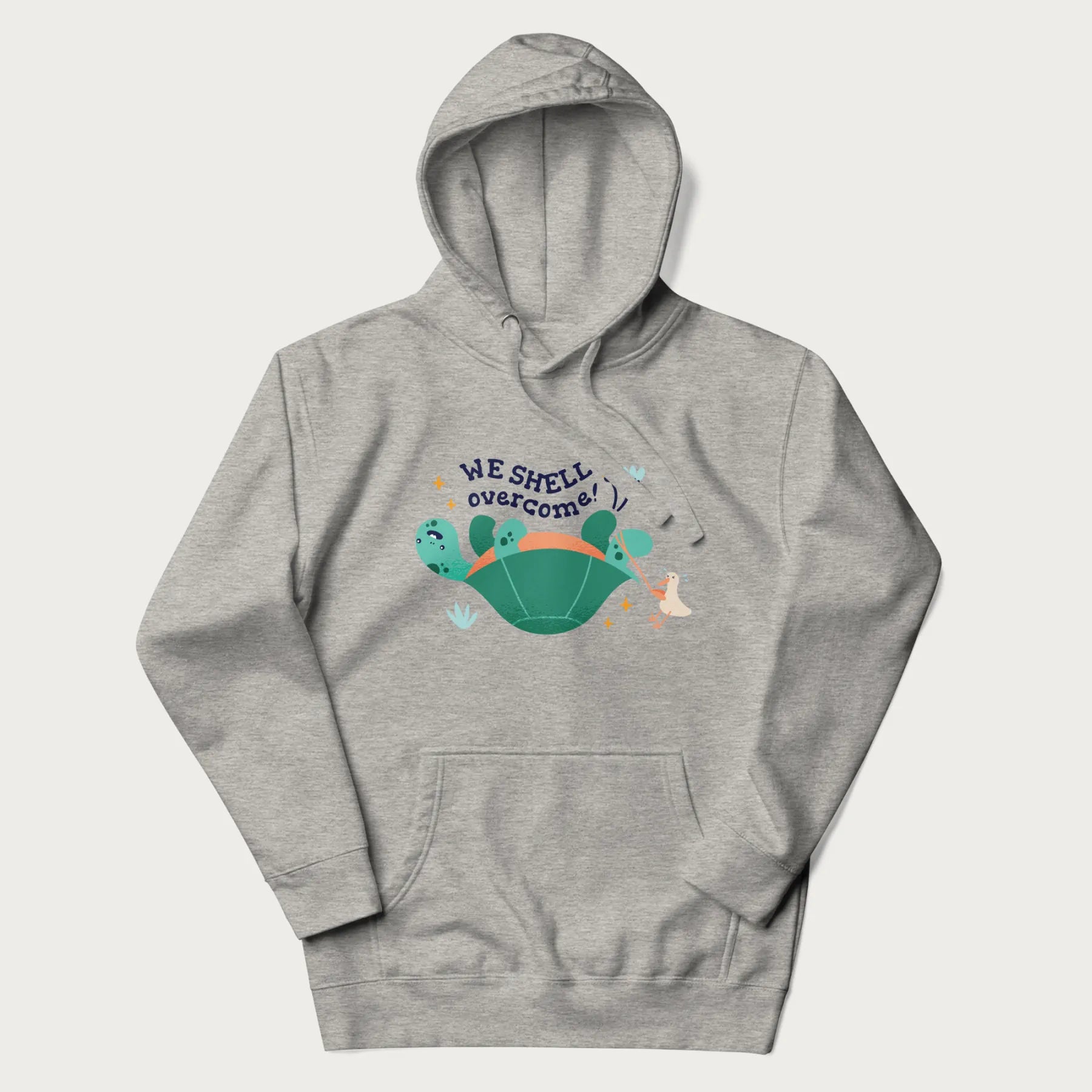 Light grey hoodie with graphic of a turtle and a duck with the text 'We Shell Overcome'.
