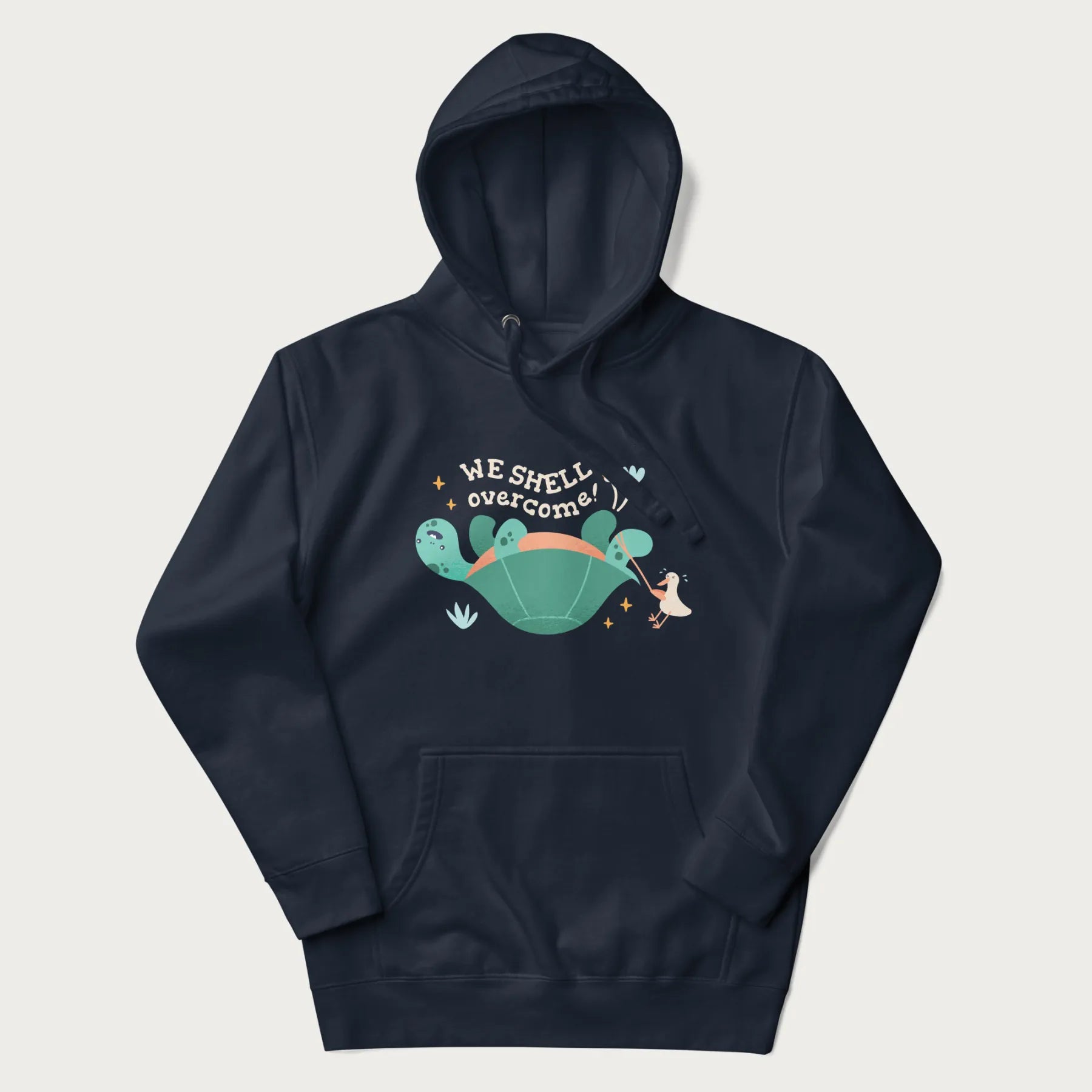 Navy blue hoodie with graphic of a turtle and a duck with the text 'We Shell Overcome'.
