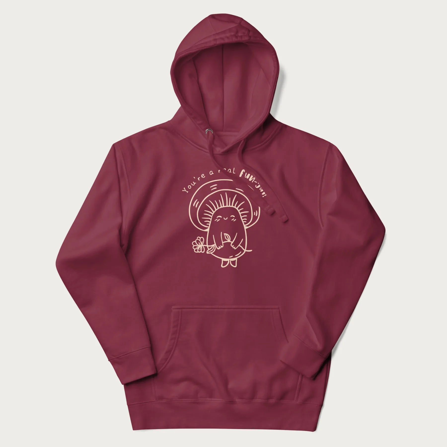 Maroon hoodie with graphic of a cute mushroom holding a flower and the text "You're a Real Fun-gal!"