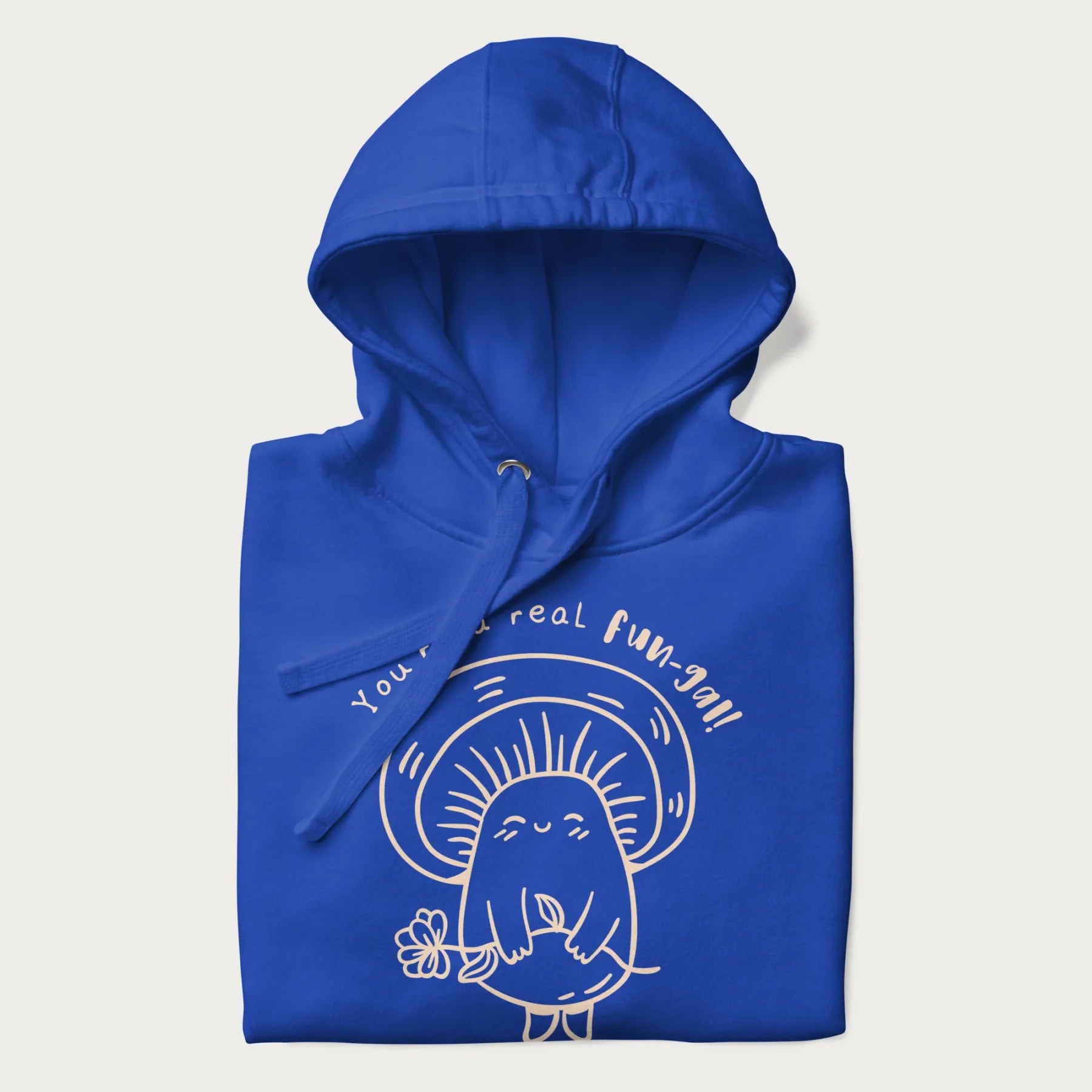 Folded royal blue hoodie with graphic of a cute mushroom holding a flower and the text "You're a Real Fun-gal!"