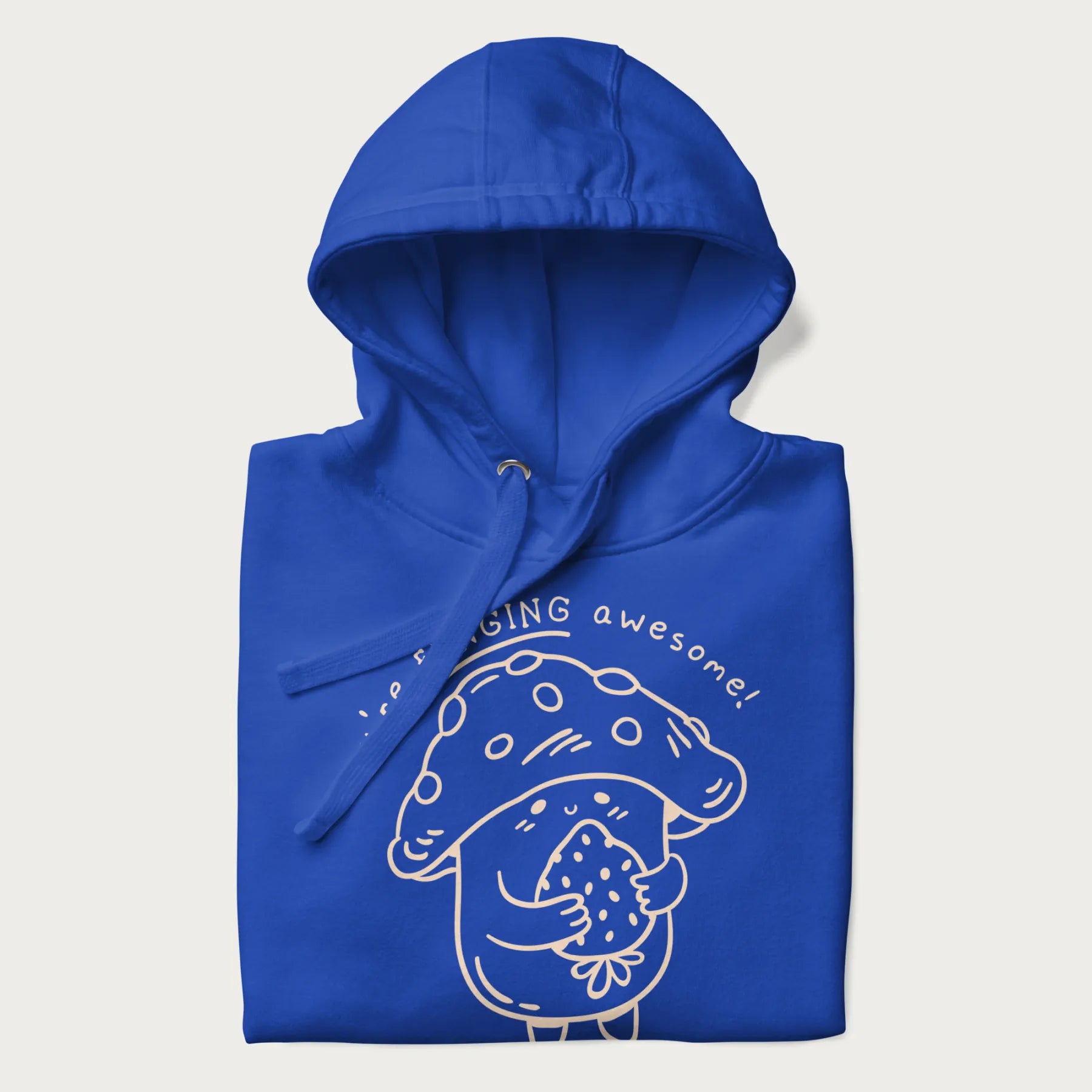 Folded royal blue hoodie with a cute mushroom graphic and the text "You're FUNGING Awesome!"