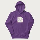 Purple hoodie with graphic of a winking cat with the text "80% cotton 20% cat hair".