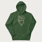 Forest green hoodie with graphic of a cute mushroom holding a leaf with the text "Boost Your Morel."