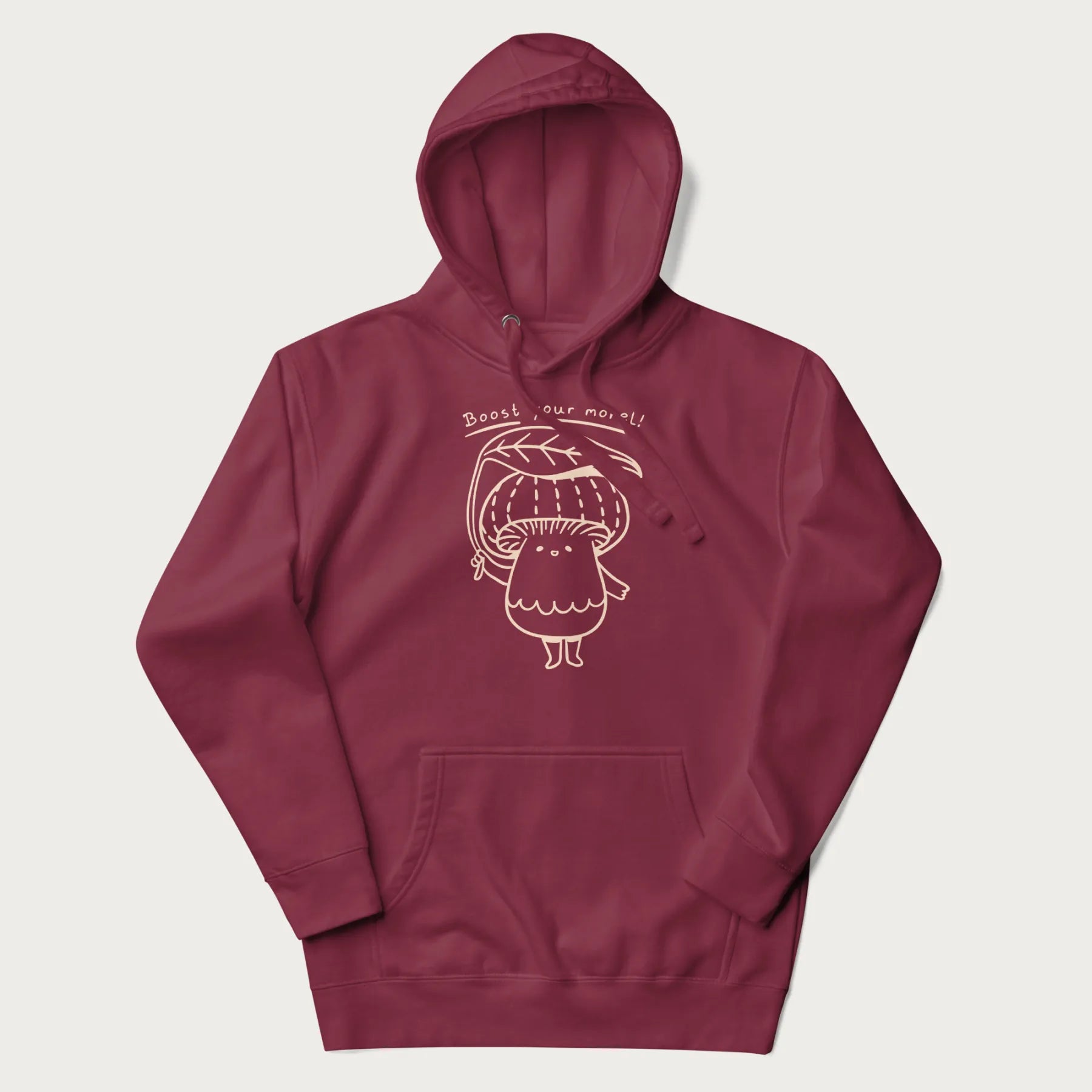 Maroon hoodie with graphic of a cute mushroom holding a leaf with the text "Boost Your Morel."